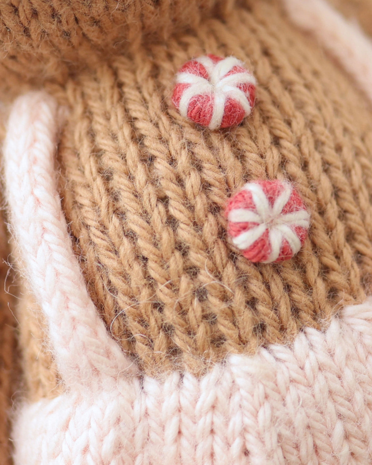 Tiny Gingerbread Sugarplum Girl doll from Cuddle + Kind with a sweet gingerbread swirl dress, soft fabric, and detailed embroidery.