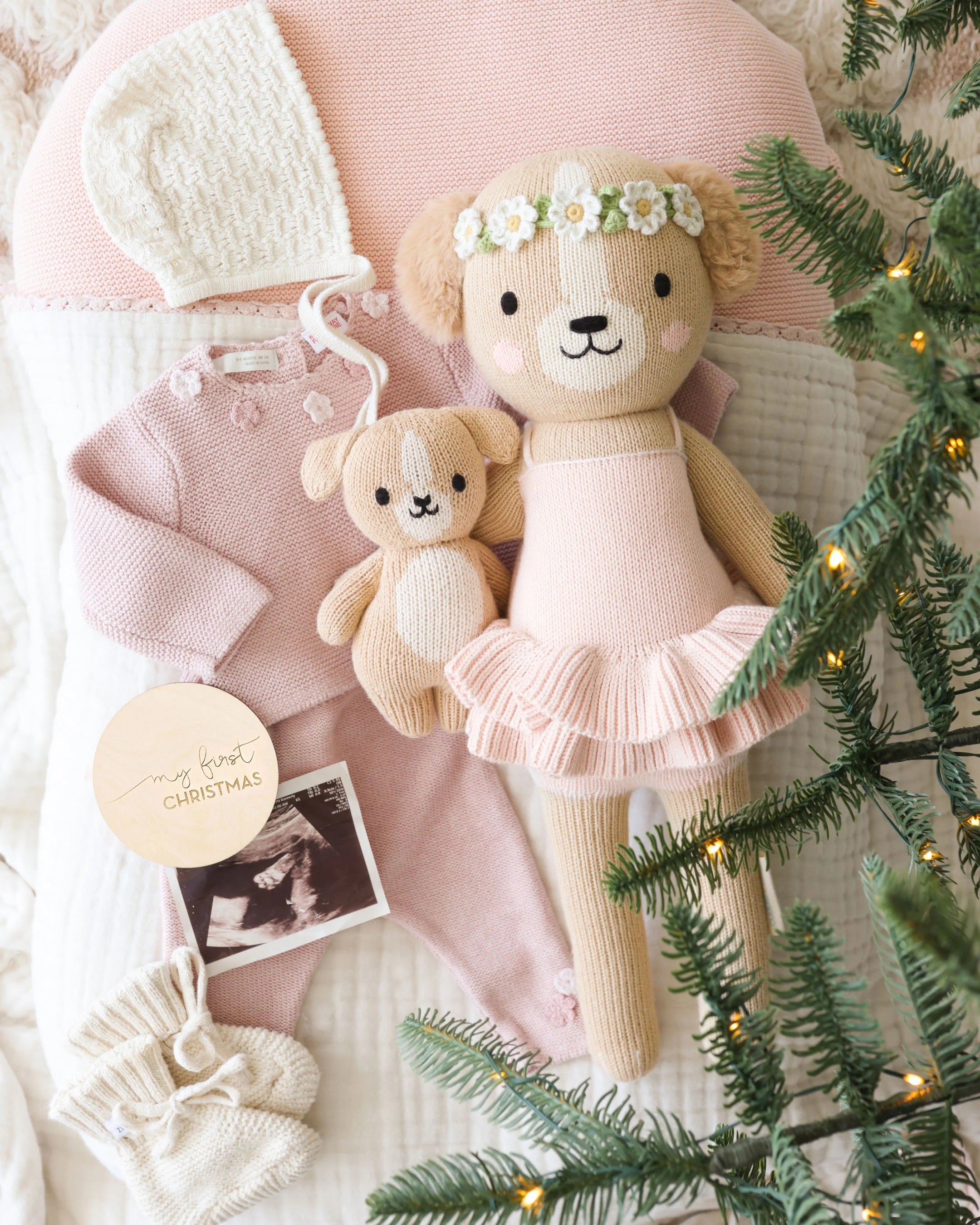 Evelyn the Golden Puppy doll in ballet pink by Cuddle + Kind, soft plush toy with detailed features and a cute expression.