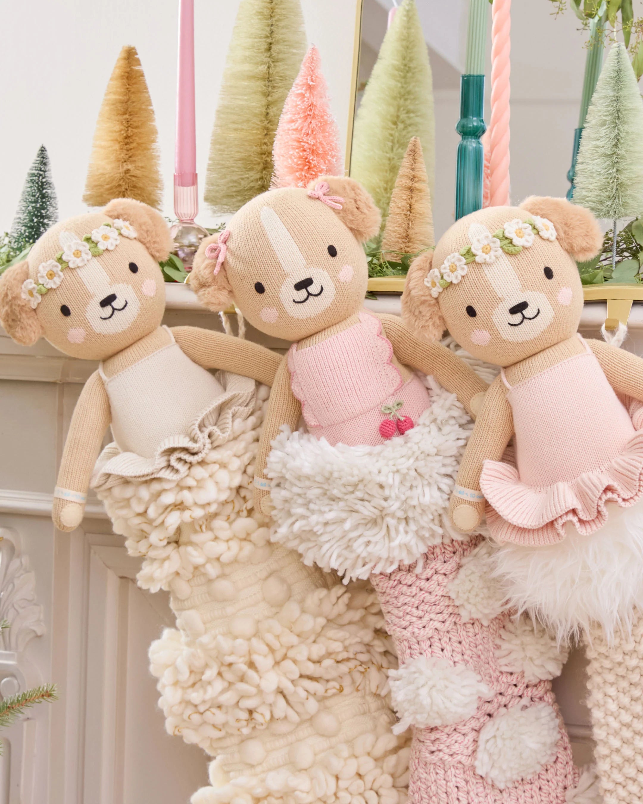 Soft plush toy of Nora the Golden Puppy from Cuddle + Kind, featuring realistic golden fur and adorable puppy details.