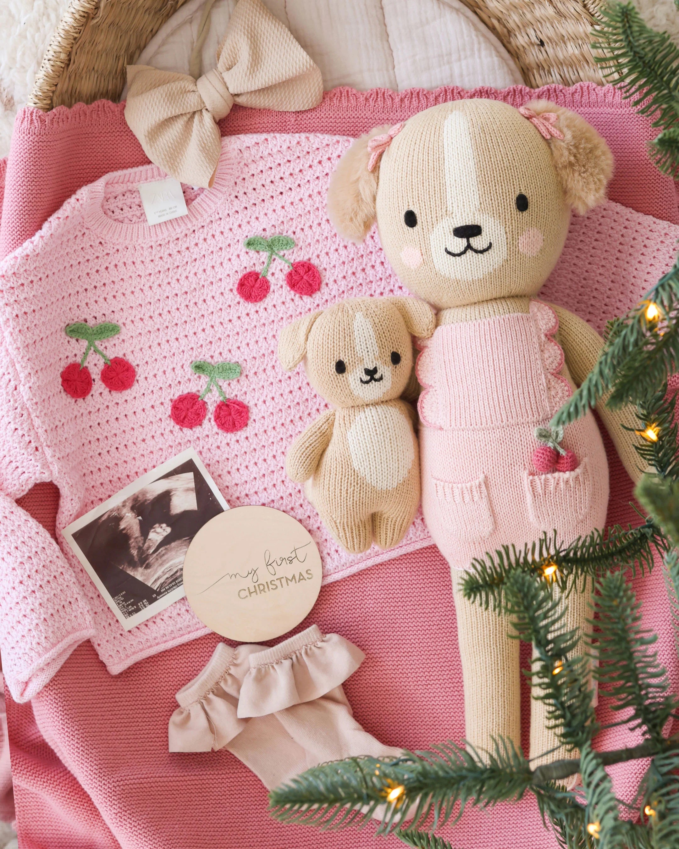 Soft plush Nora the Golden Puppy from Cuddle + Kind with detailed fur and adorable face, perfect for cuddling and play.