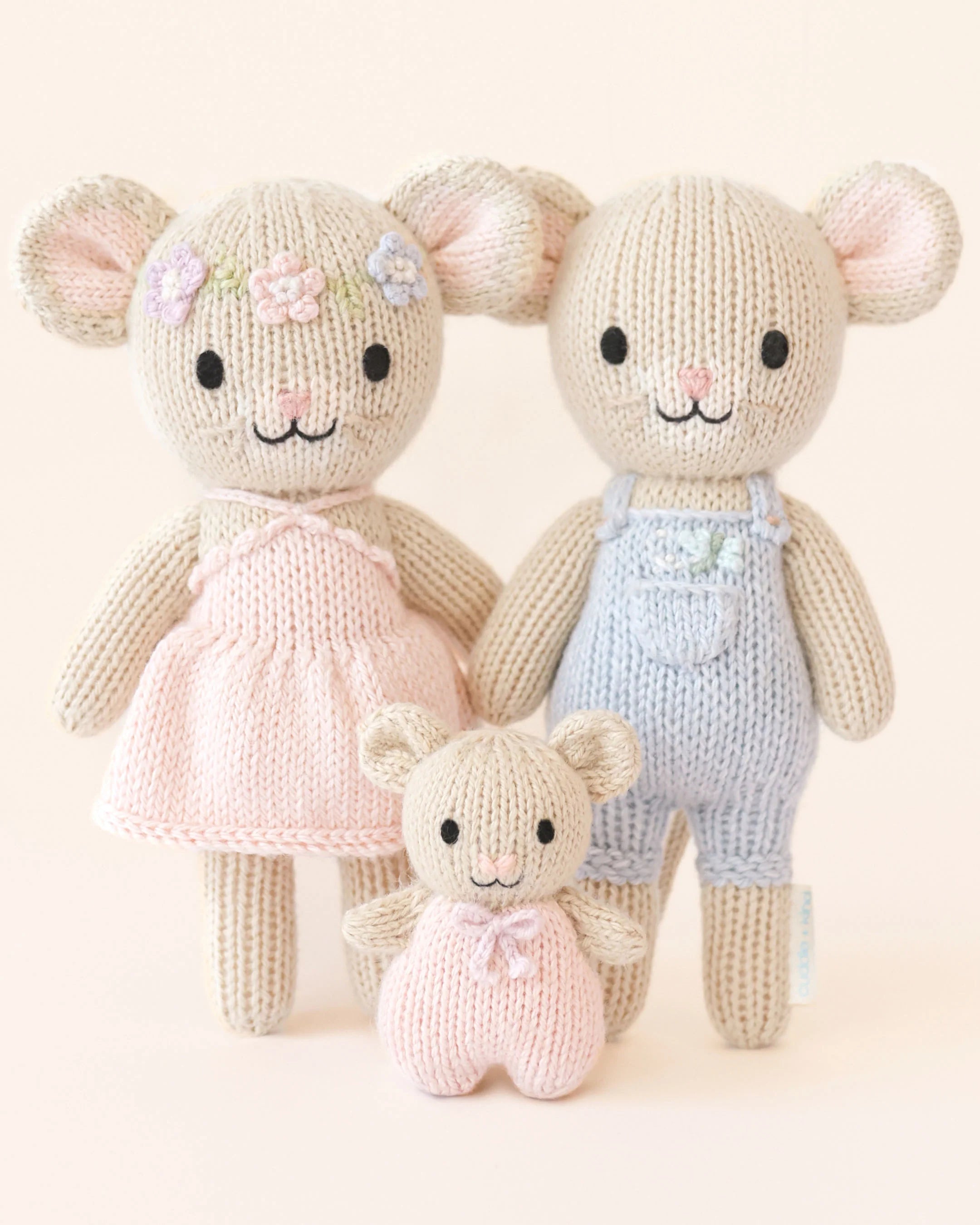 Tiny Bailey the Mouse plush toy from Cuddle + Kind, soft hand-knit mouse with detailed features and gentle expression.