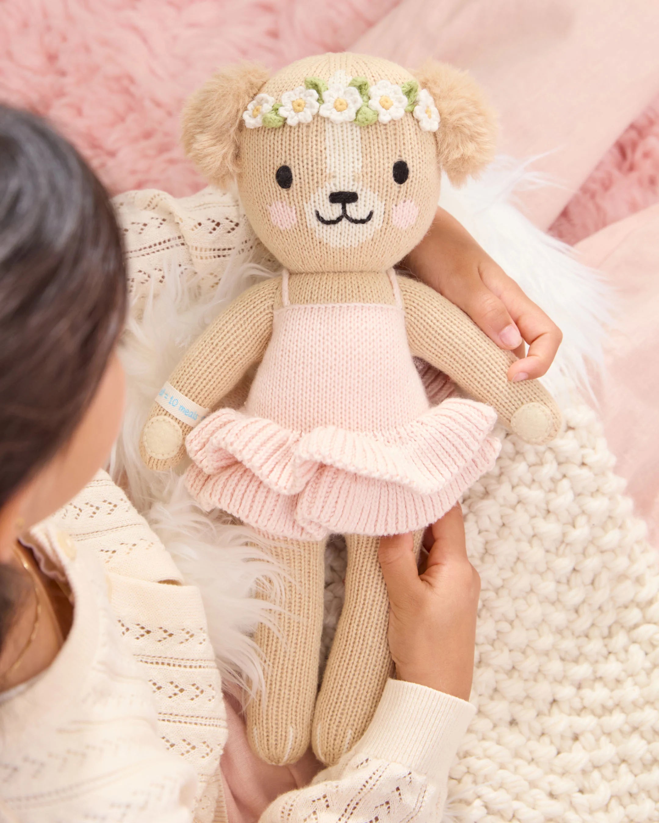 Evelyn the Golden Puppy plush toy in ballet pink from Cuddle + Kind, soft and cuddly with detailed features for children.