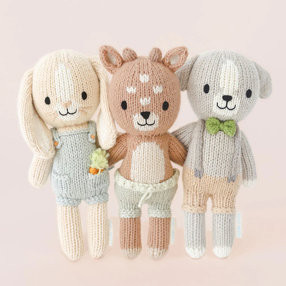Tiny Henry the Bunny plush toy from Cuddle + Kind featuring soft, detailed fabric and adorable bunny features.