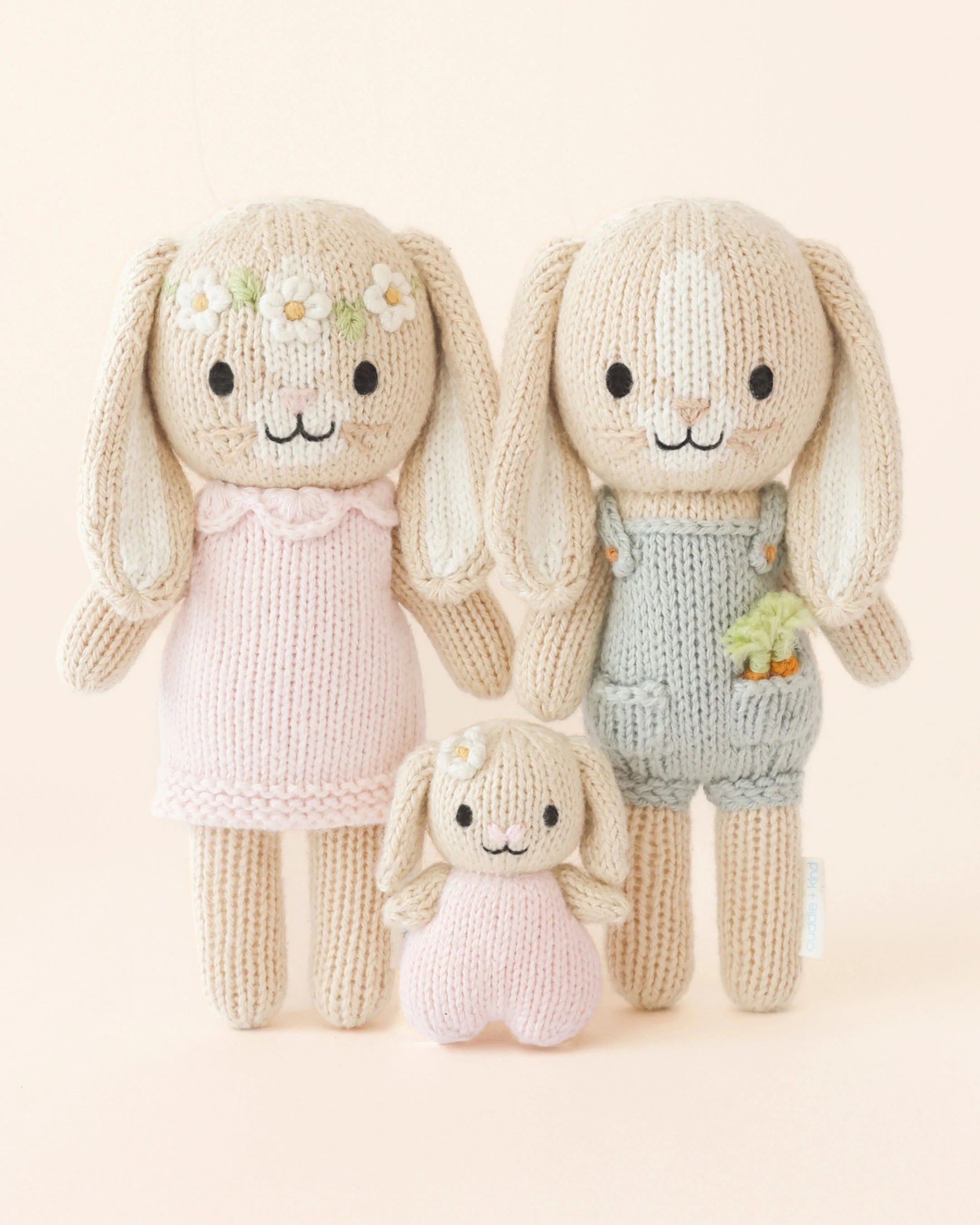 Tiny Henry the Bunny plush toy from Cuddle + Kind, soft stuffed bunny with detailed features, ideal for cuddling and play.