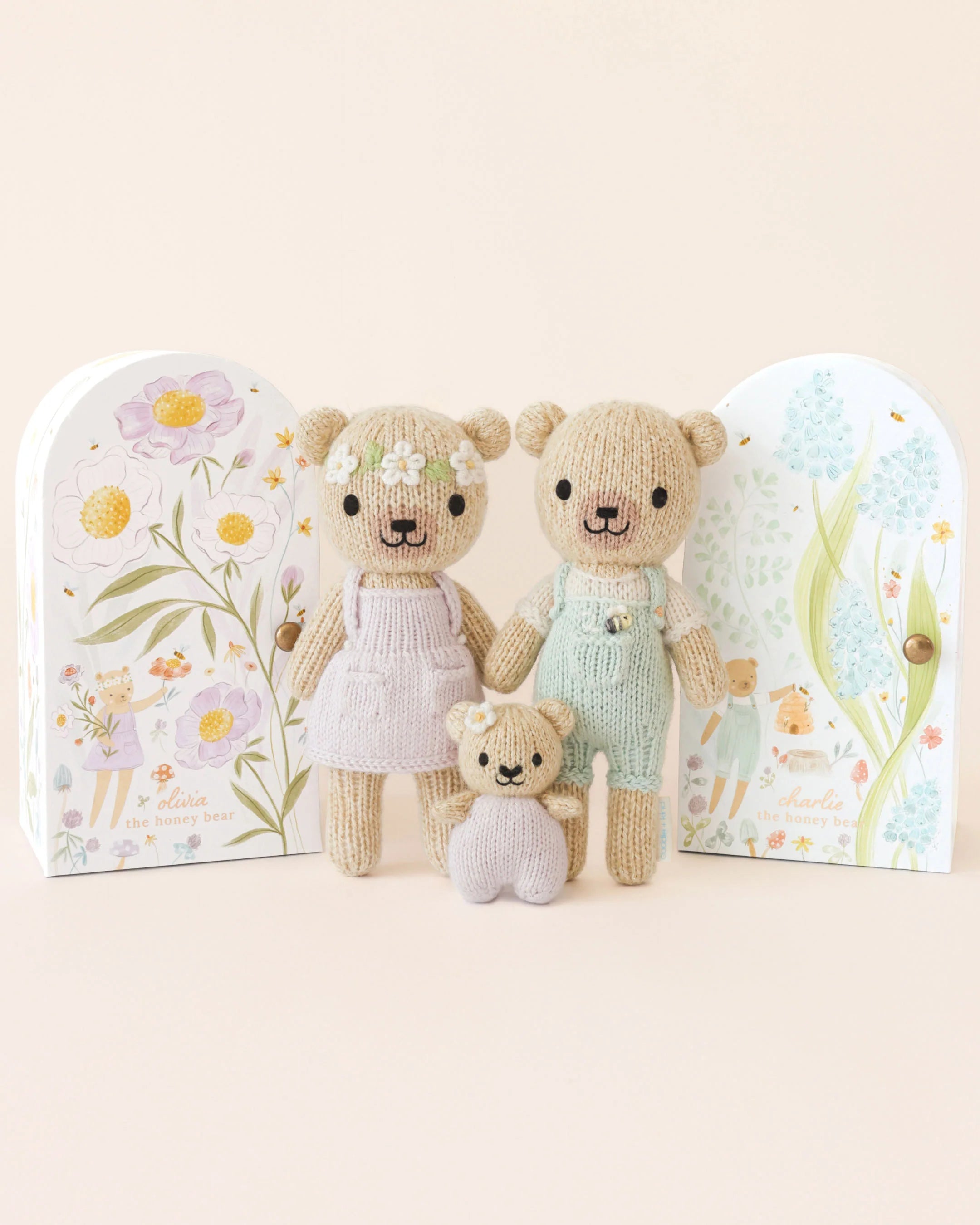Tiny Olivia the Honey Bear plush toy by Cuddle + Kind, soft and cuddly with detailed honey bear features.