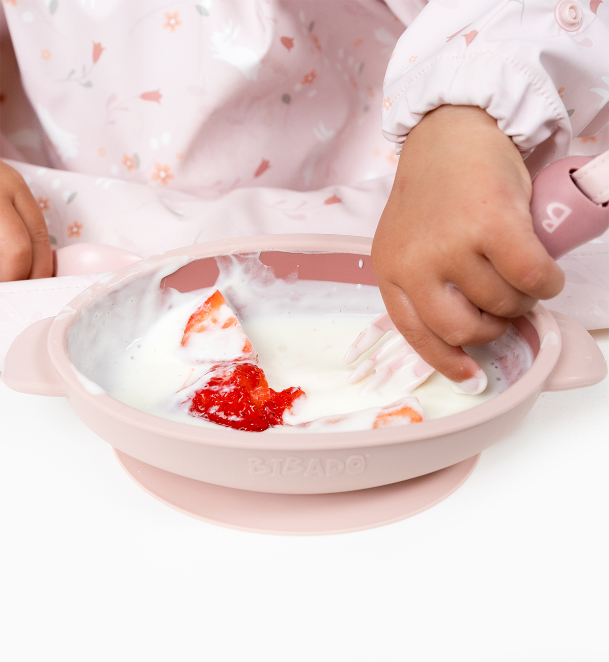Bibado silicone suction bowl in blush color with a wide base and secure suction for easy feeding for babies and toddlers.