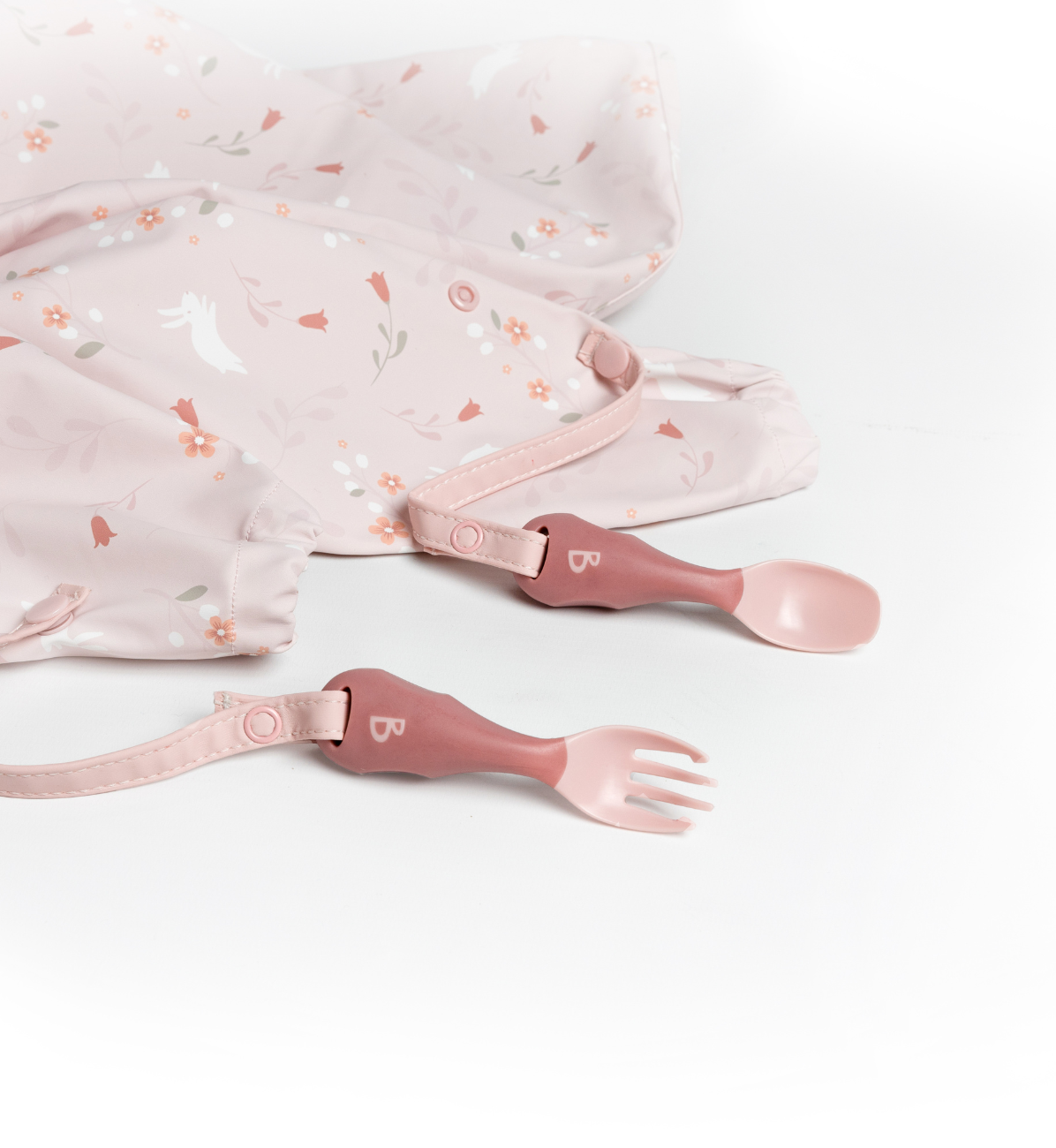 Bibado Handi Cutlery in blush color, featuring child-friendly utensils with ergonomic handles for easy gripping and use.