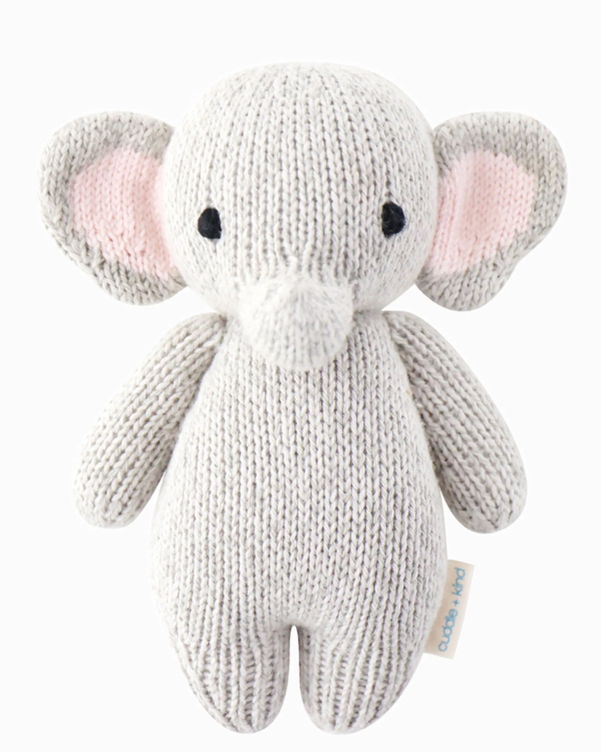 Soft, plush baby elephant toy from Cuddle + Kind featuring gentle gray fabric and embroidered facial details.