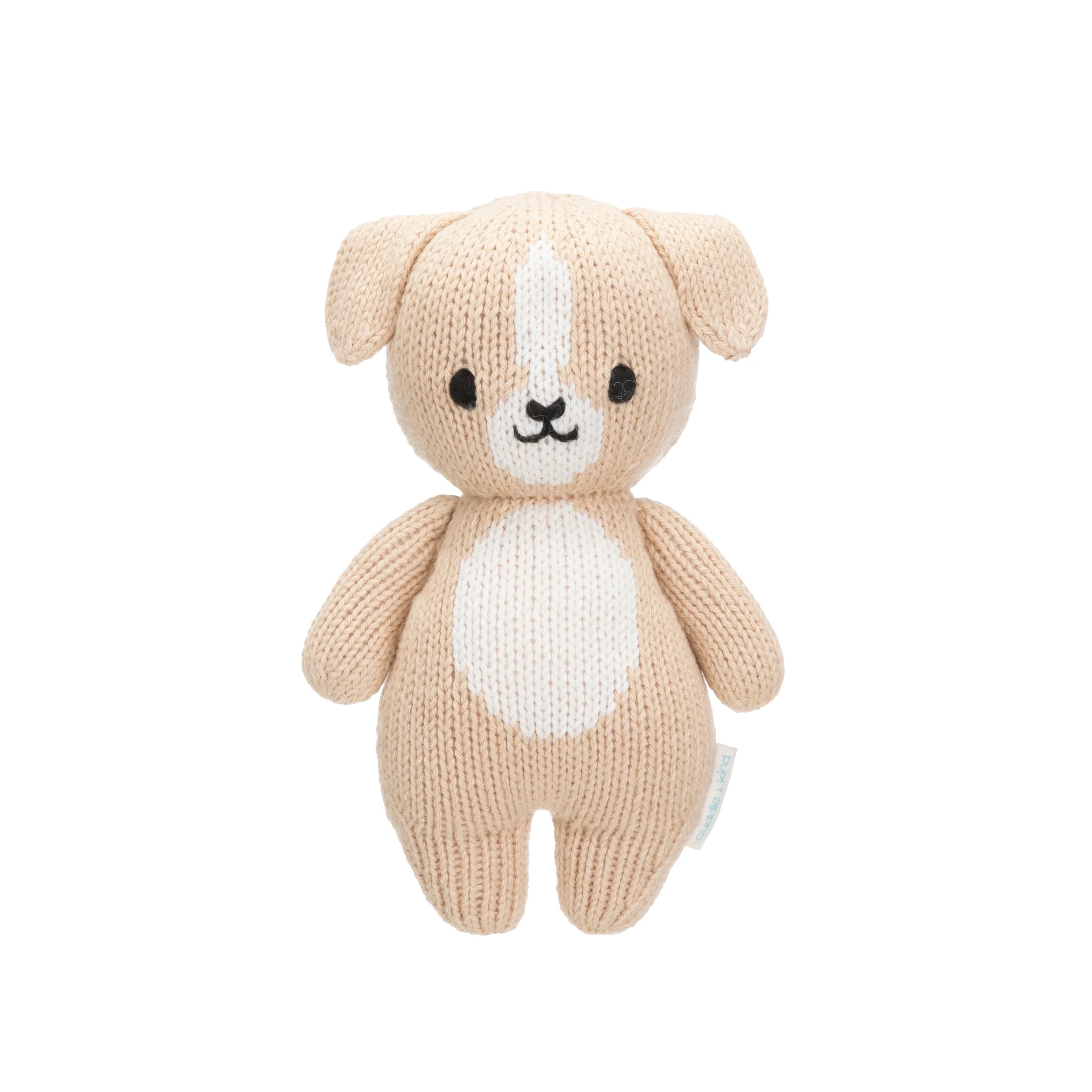 Soft plush Baby Puppy toy from Cuddle + Kind featuring detailed puppy design, perfect for cuddling and comforting.