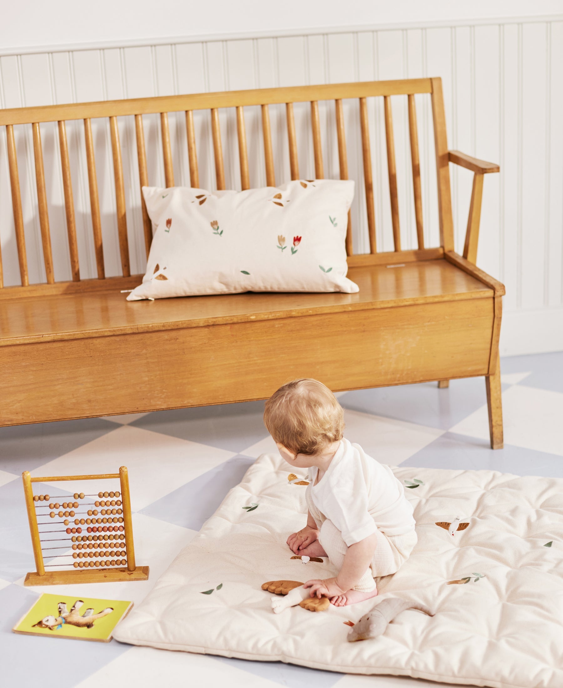 Dear April Meri Play Mattress in Songbirds design with colorful fabric and soft padding for toddlers' play area.