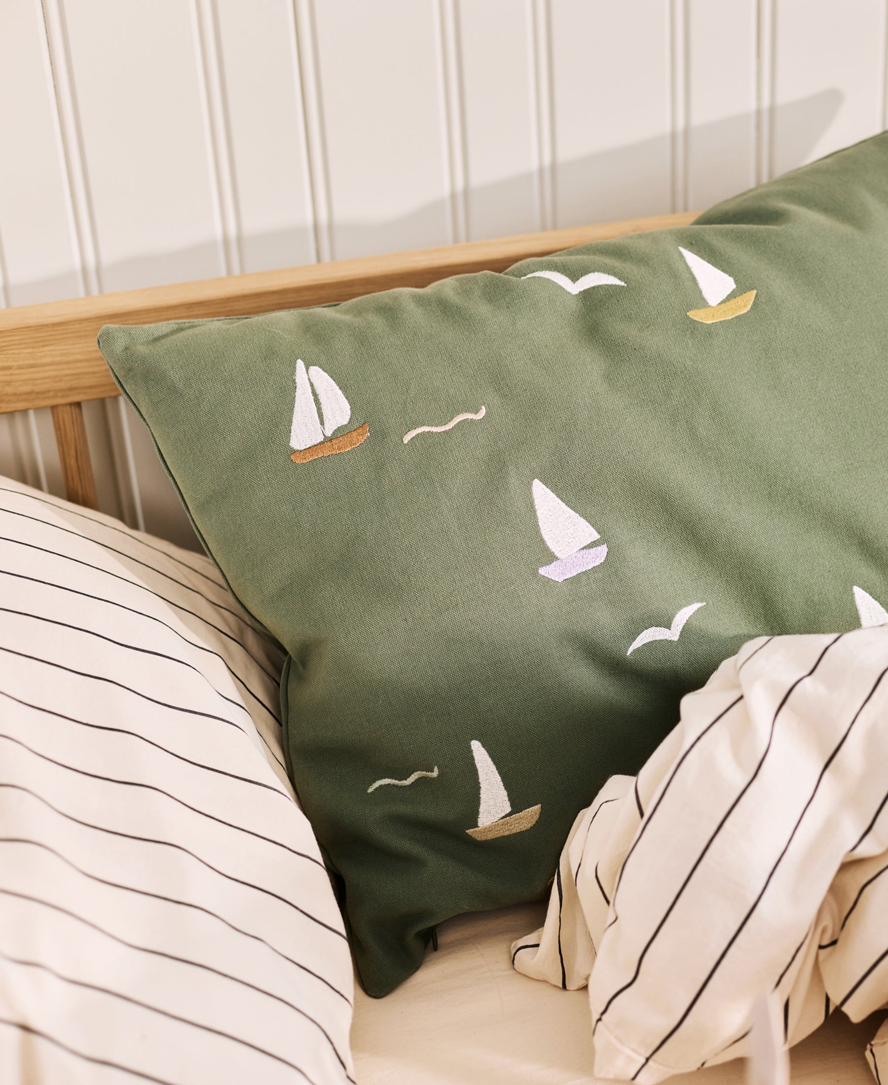 Dear April Cinna Cushion with sailboat design, featuring nautical sailboats on soft fabric, perfect for coastal decor.