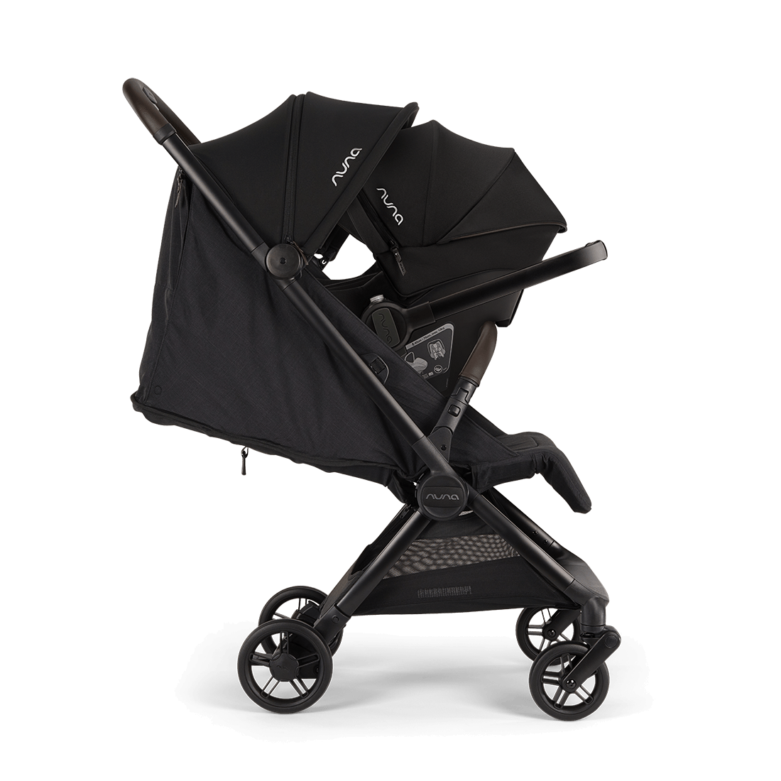 Nuna VIAA cabn Cabin Stroller in Caviar, side profile with reclined seat and extended canopy