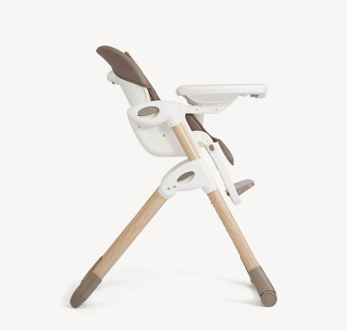 Joie Mimzy Recline From-Birth High Chair in Strata Acorn Wood, profile view showing wooden legs and adjustable recline feature.