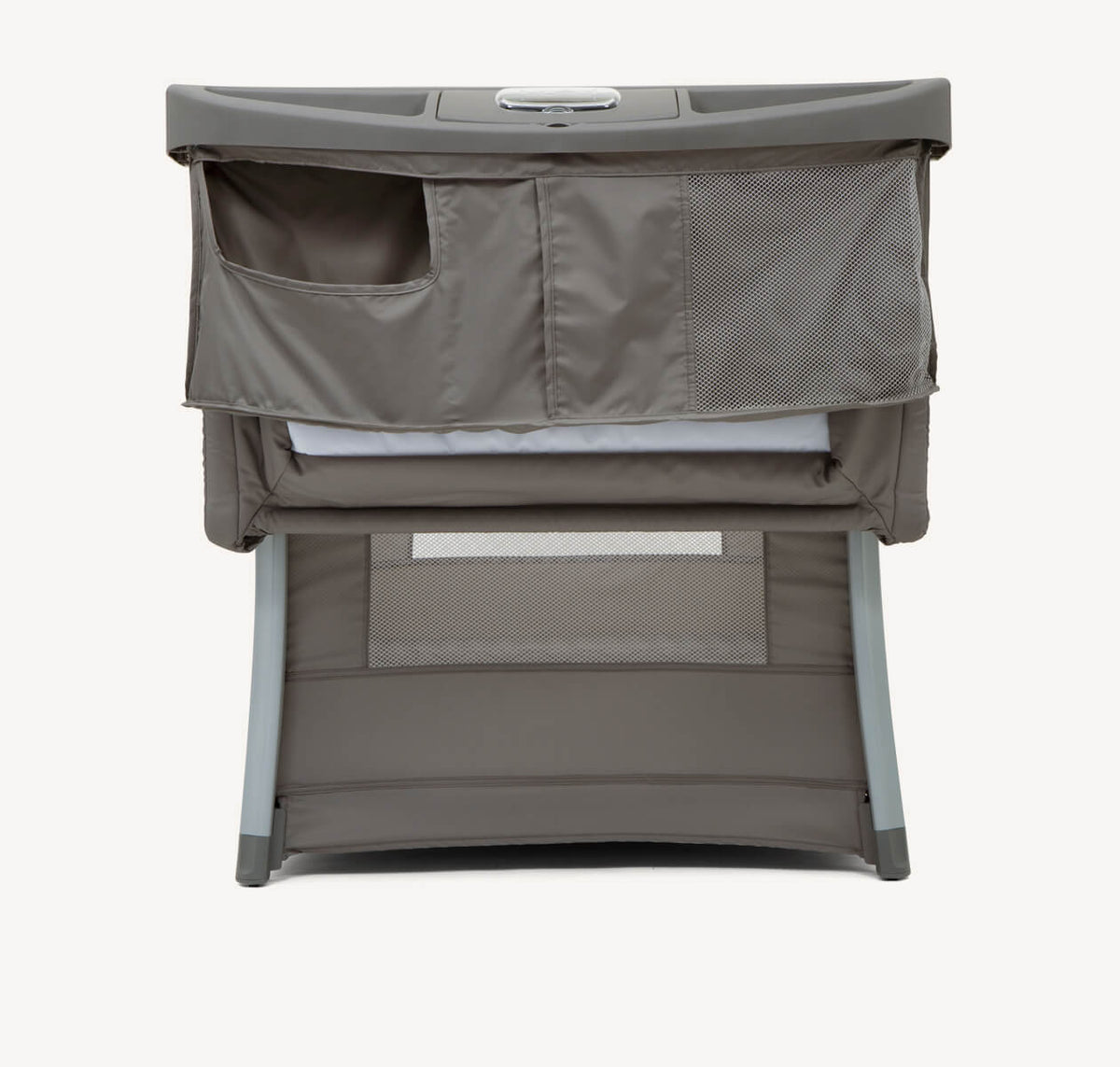 Joie Illusion Travel Cot in nickel color, shown in profile view with open sides and sturdy frame for portable sleeping convenience.