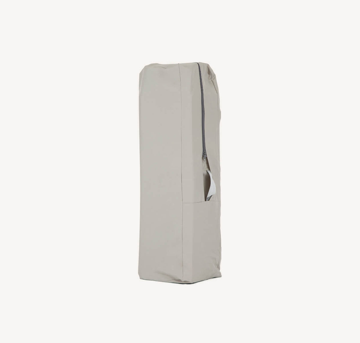Joie Commuter Change Travel Cot in speckled pattern, folded in bag for easy transport and storage.