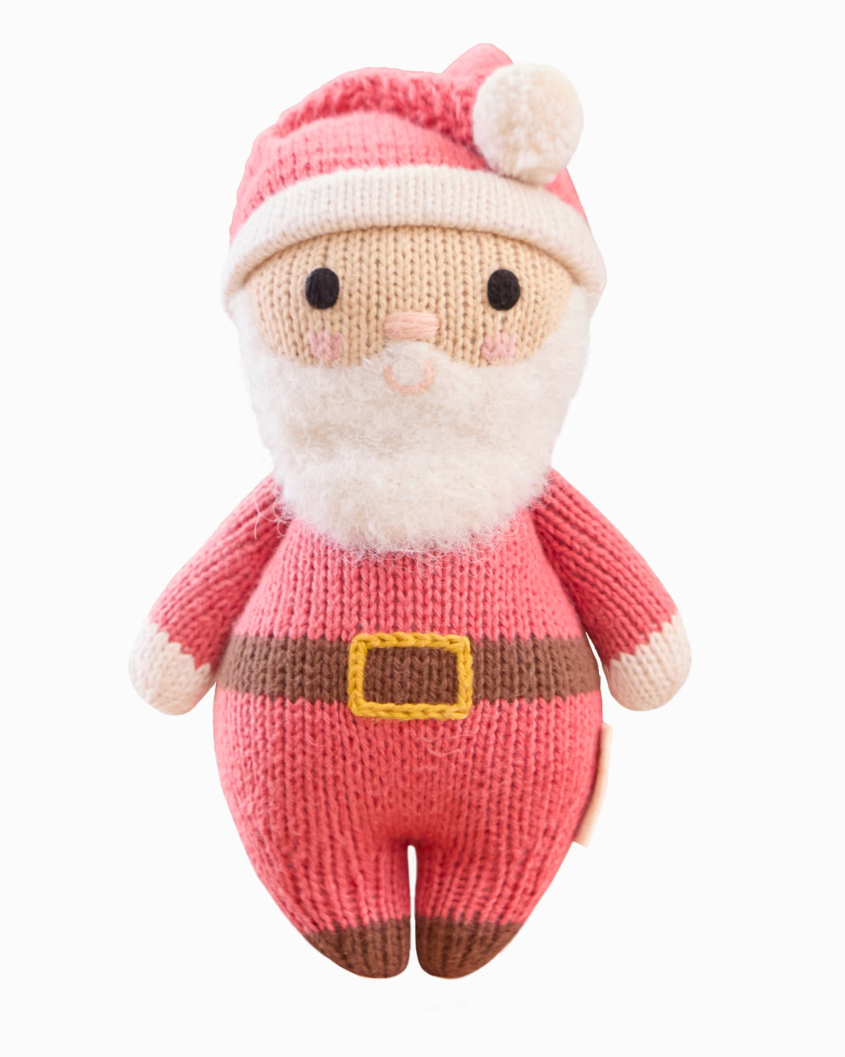Baby Santa doll from Cuddle + Kind with a jolly red outfit and cheerful expression, soft plush toy for children.
