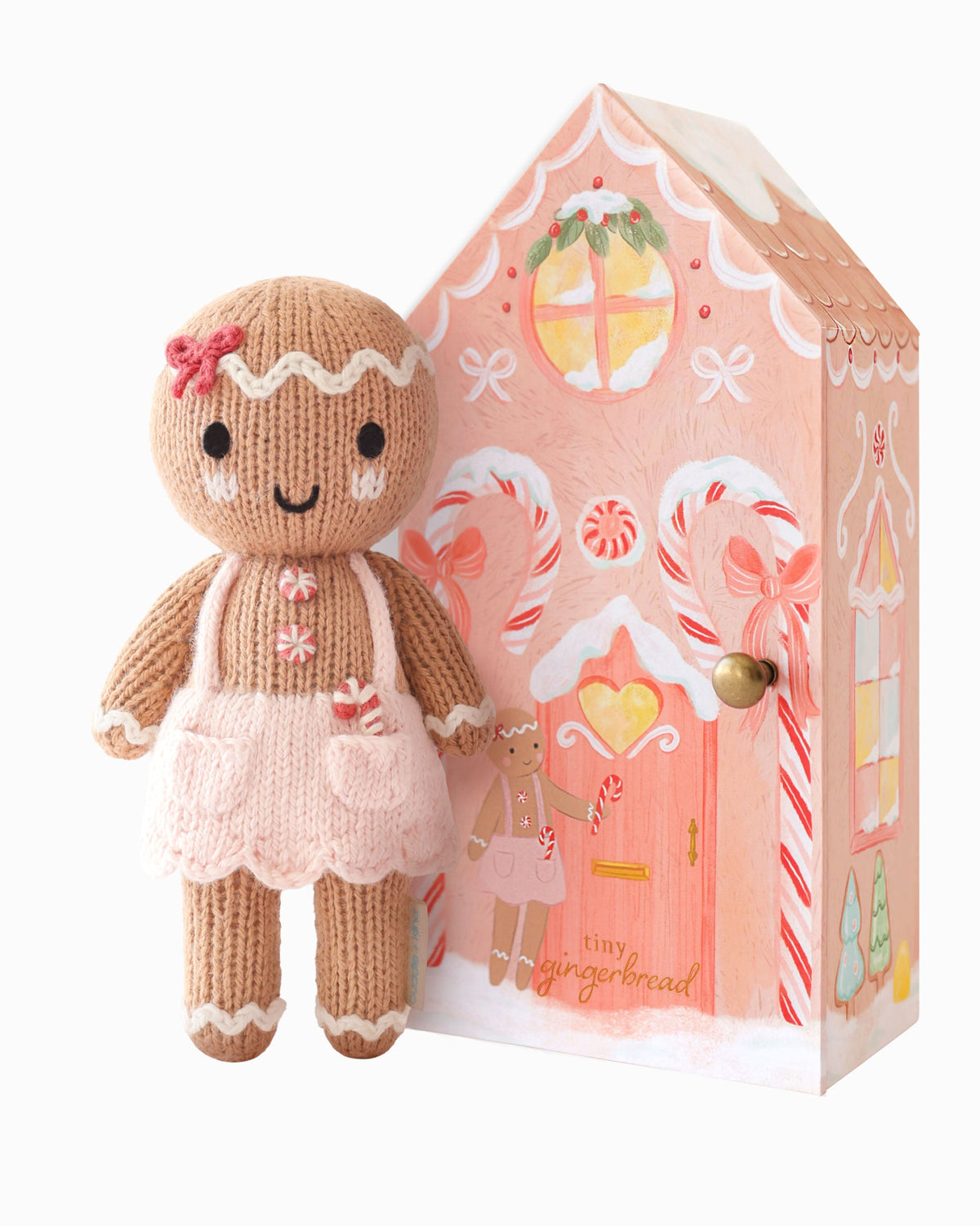 Tiny Gingerbread Sugarplum Girl plush toy by Cuddle + Kind with a soft, smiling face and gingerbread-themed details.