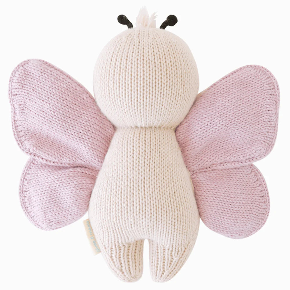 Soft plush baby butterfly toy by Cuddle + Kind with colorful wings, designed for gentle cuddles and infant comfort.