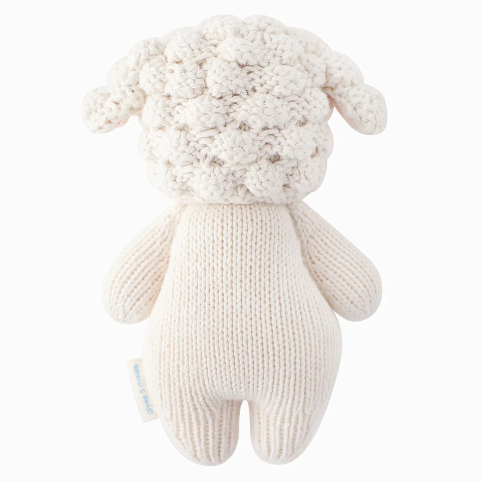 Medium-sized Cuddle + Kind Baby Lamb plush toy with soft white fur and gentle face, perfect for cuddling and comforting.