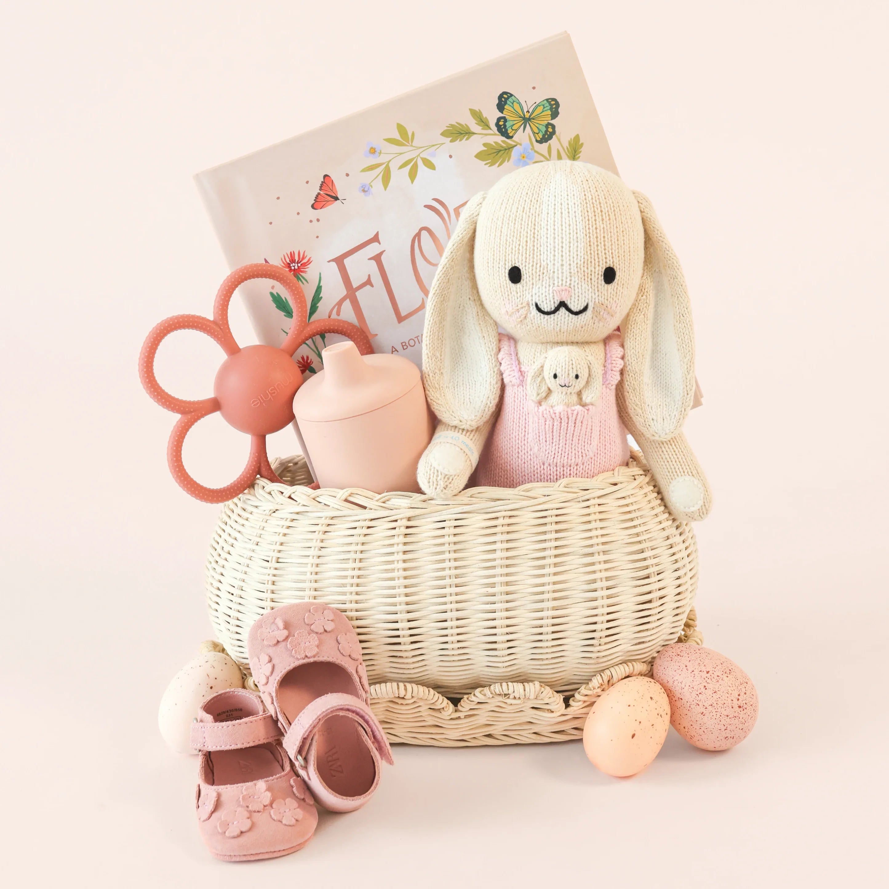 Briar the Bunny plush toy in peony pink by Cuddle + Kind, showing soft fabric and adorable bunny face with long ears.