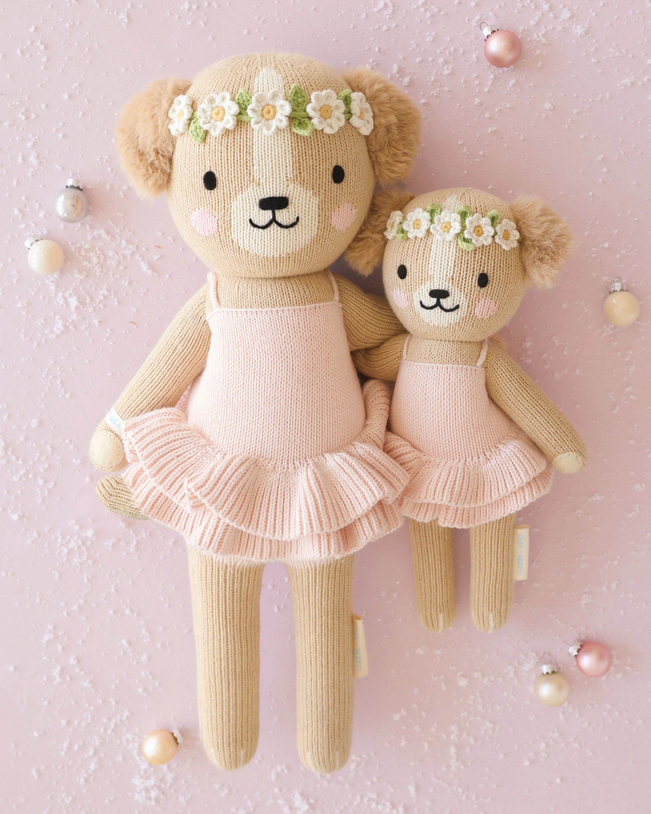Evelyn the Golden Puppy plush toy in ballet pink by Cuddle + Kind, soft fabric with detailed puppy features and a gentle expression.
