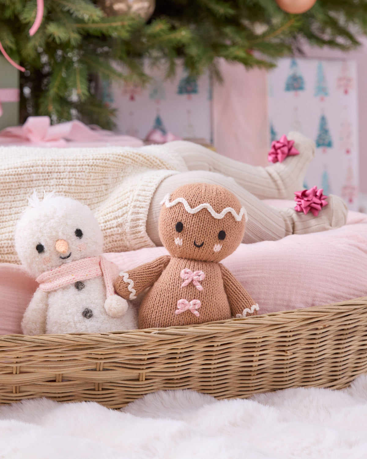 Baby Snowman plush toy from Cuddle + Kind with candy fleck details, soft and adorable for infants and young children.