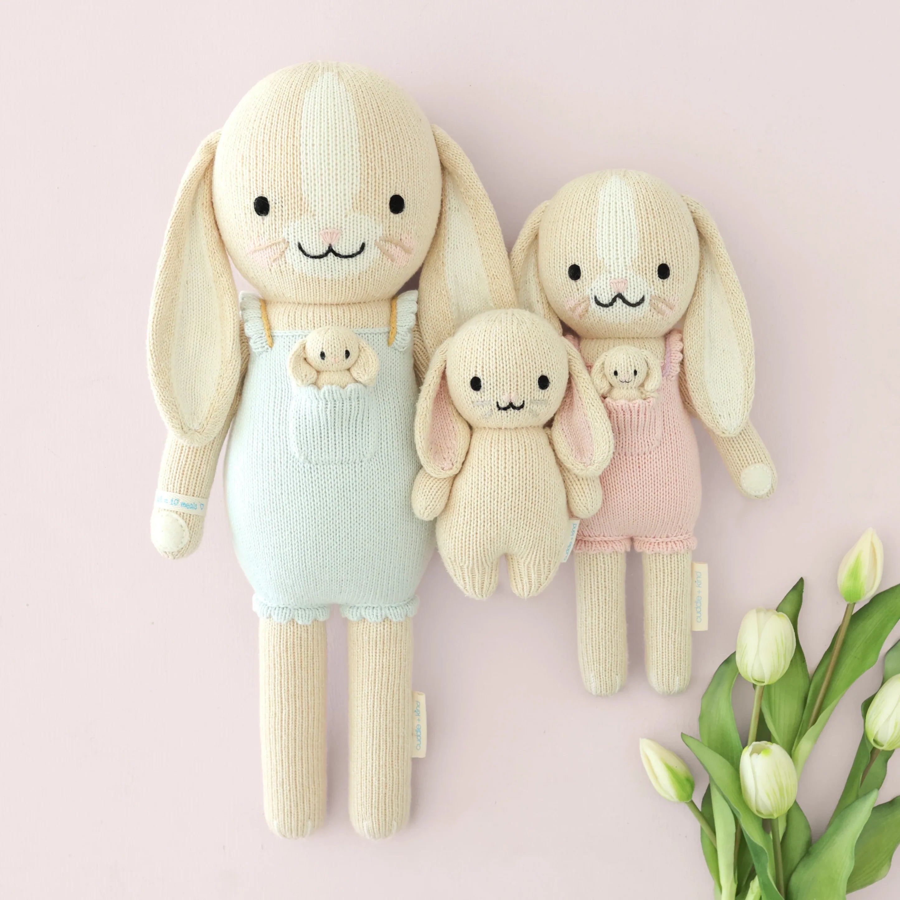 Cuddle + Kind Briar the Bunny in Peony Pink plush toy with soft features and embroidered face, perfect for cuddling and play.