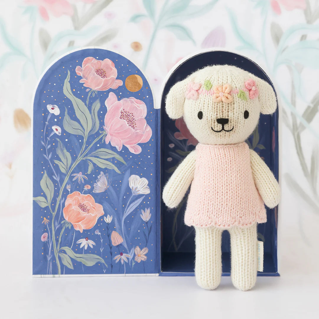 Tiny Charlotte the Dog plush toy by Cuddle + Kind, soft fabric with detailed features, perfect for cuddling and gifting.