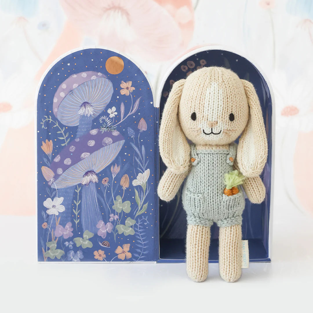 Tiny Henry the Bunny plush toy from Cuddle + Kind featuring soft fabric and adorable bunny design on a white background.