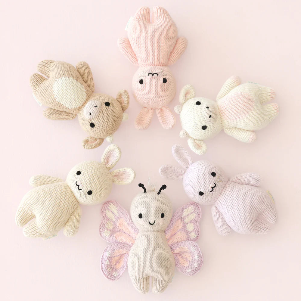 Soft baby butterfly plush toy from Cuddle + Kind featuring colorful wings and a gentle, cuddly design for infants.