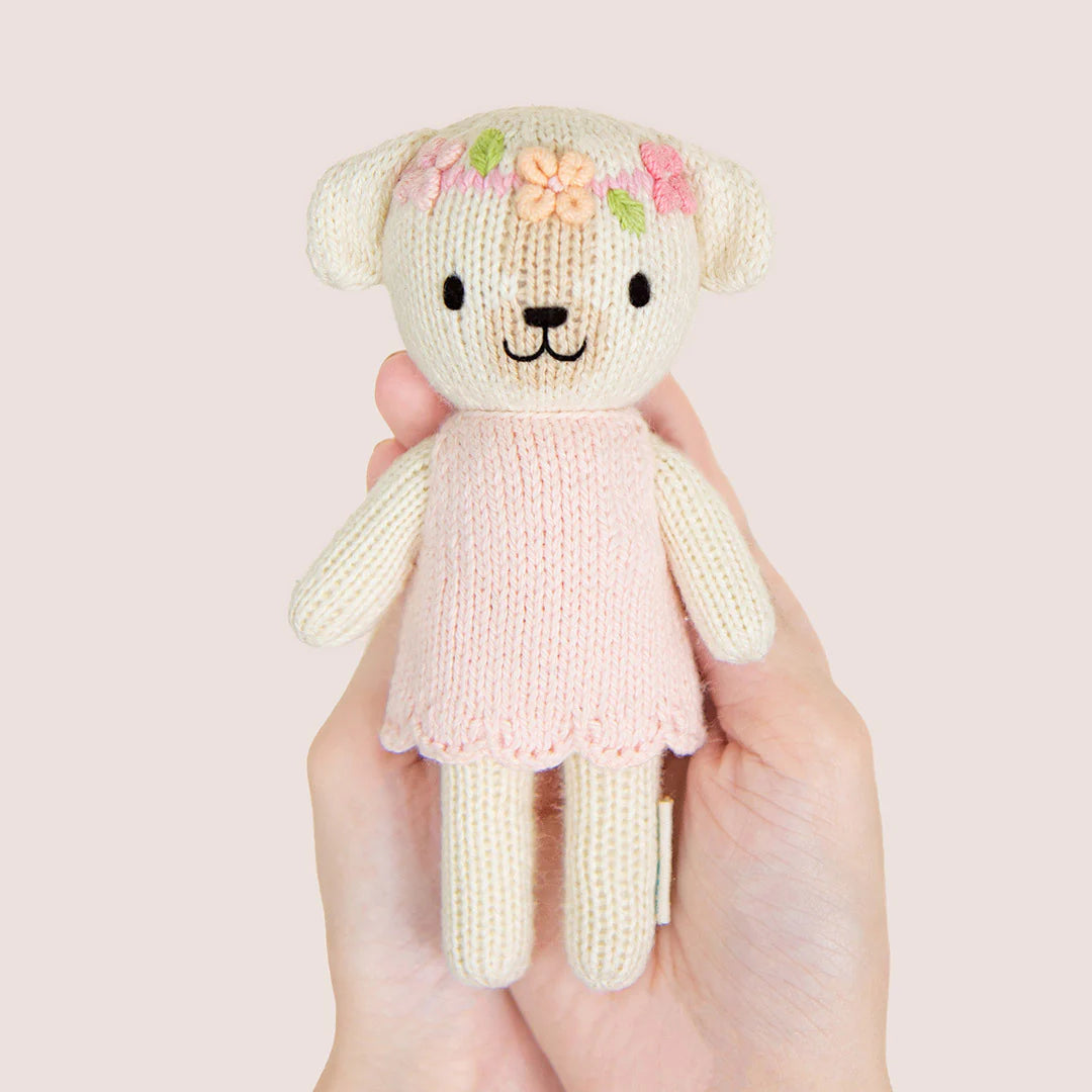 Tiny Charlotte the Dog plush toy from Cuddle + Kind, small soft stuffed animal with detailed features and adorable expression.