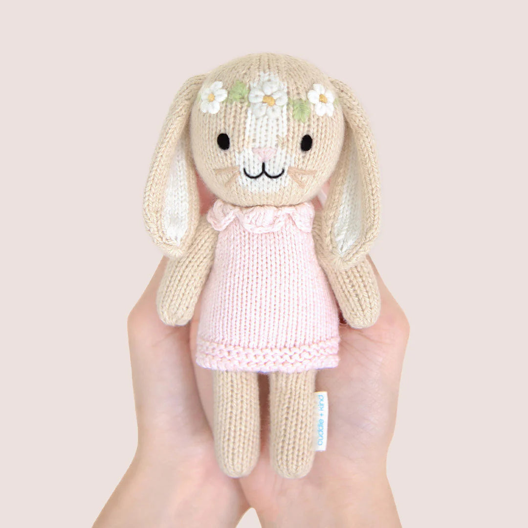 Tiny Hannah the Bunny in blush from Cuddle + Kind, plush toy with soft fabric and detailed bunny features.