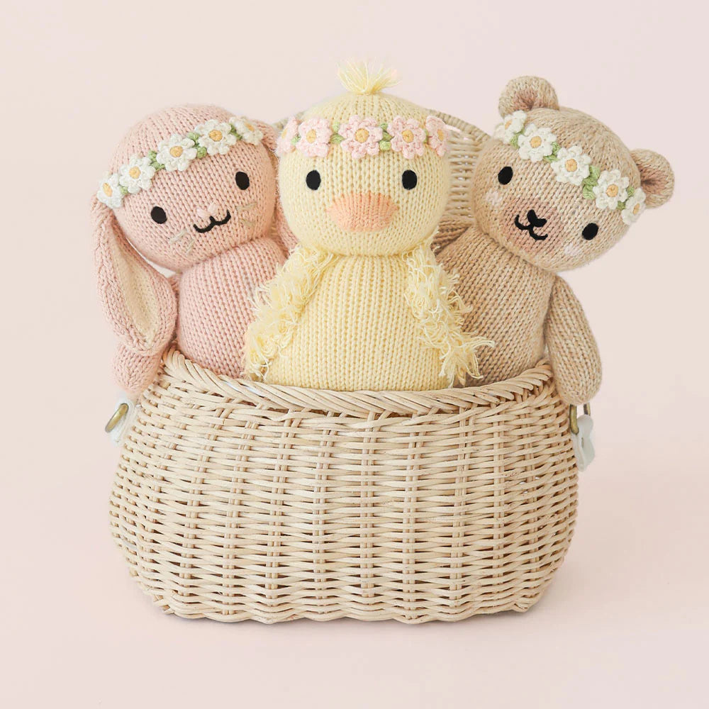 Baby Honey Bear cuddly toy by Cuddle + Kind, ivory floral design with a soft bunny face and blush floral accents.