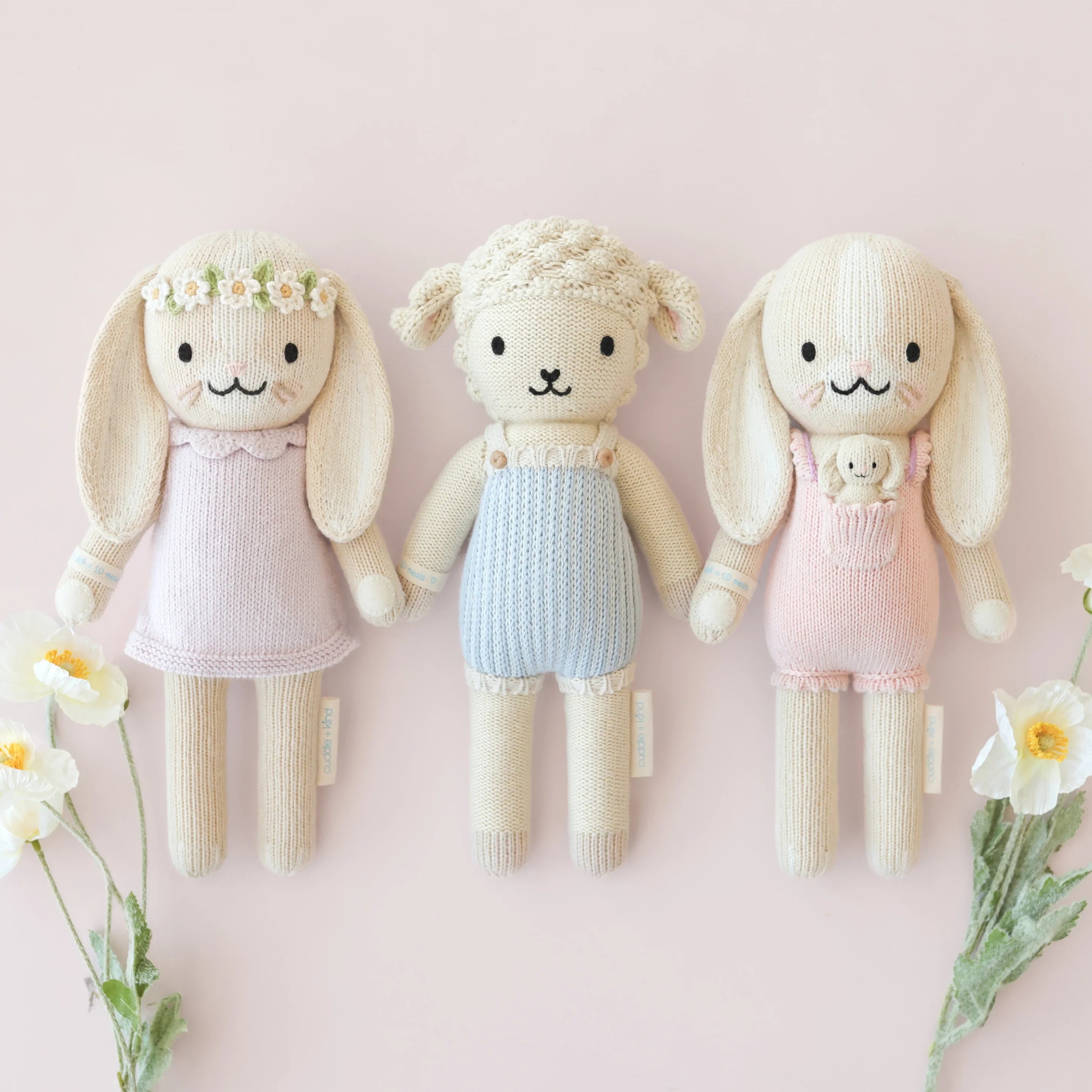 Peony pink Briar the Bunny plush toy from Cuddle + Kind, featuring soft fabric and expressive embroidered eyes.