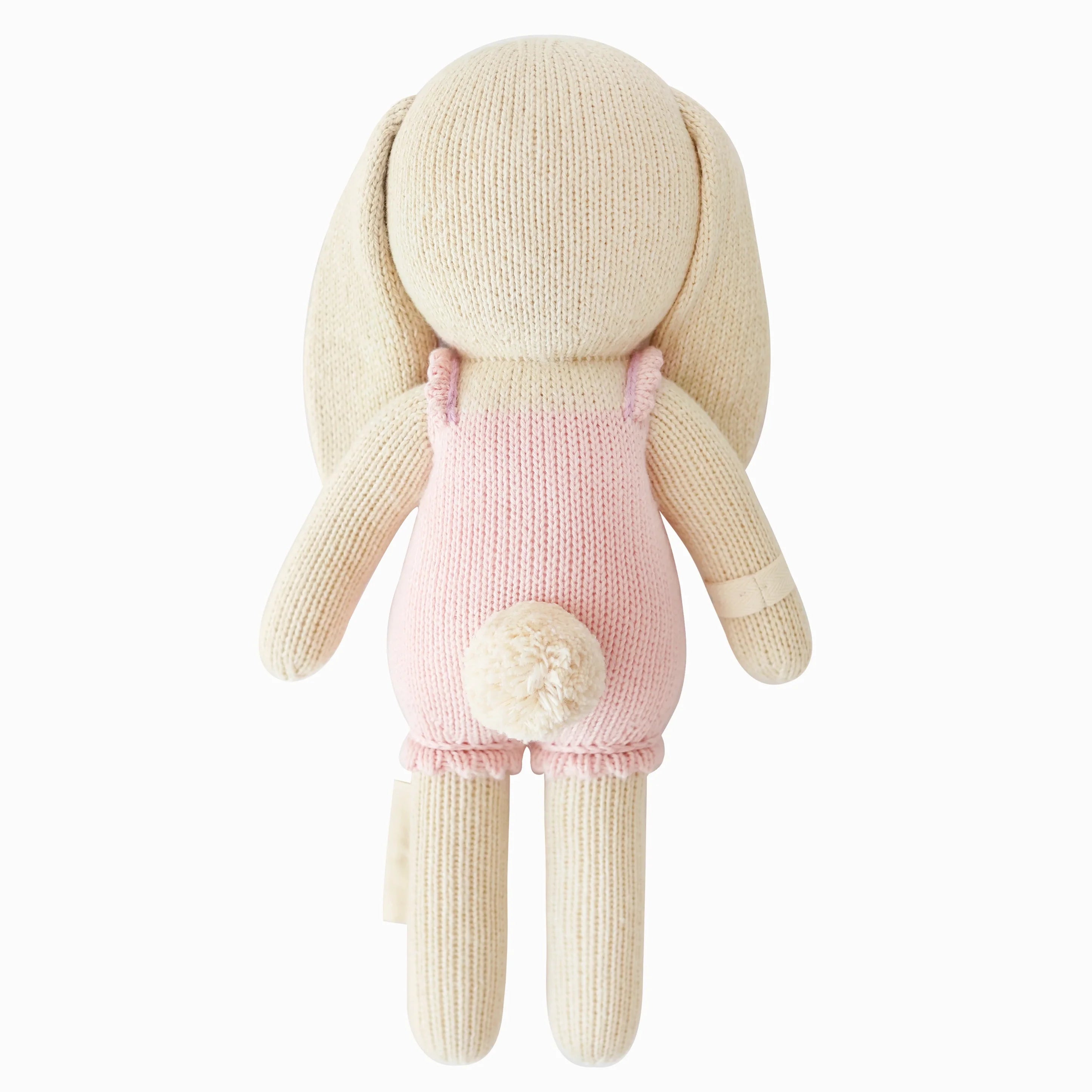 Briar the Bunny in peony pink from Cuddle + Kind, a soft plush toy with detailed stitching and gentle expression.