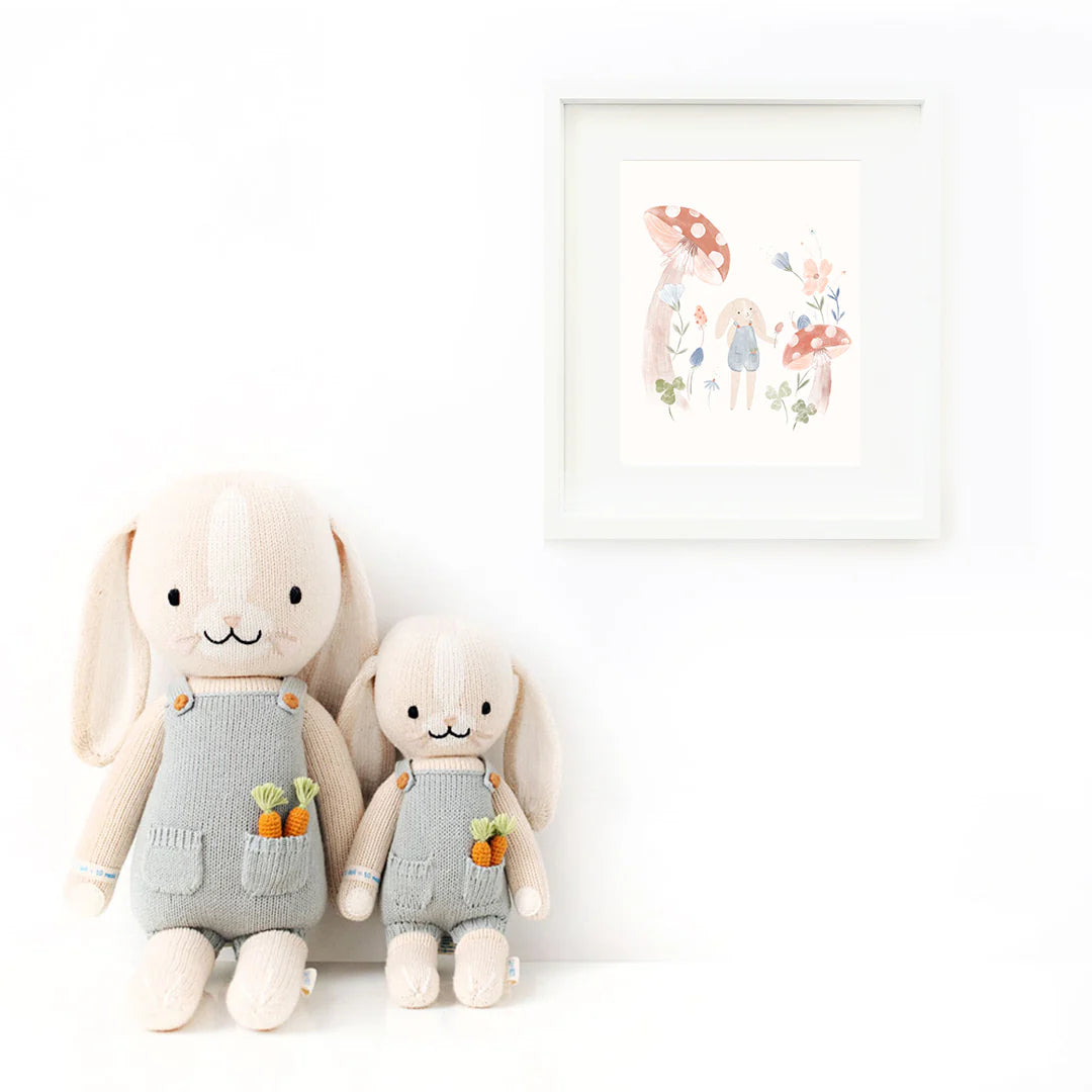 Henry the Bunny plush from Cuddle + Kind featuring soft fabric and detailed bunny features, ideal for cuddling and display.