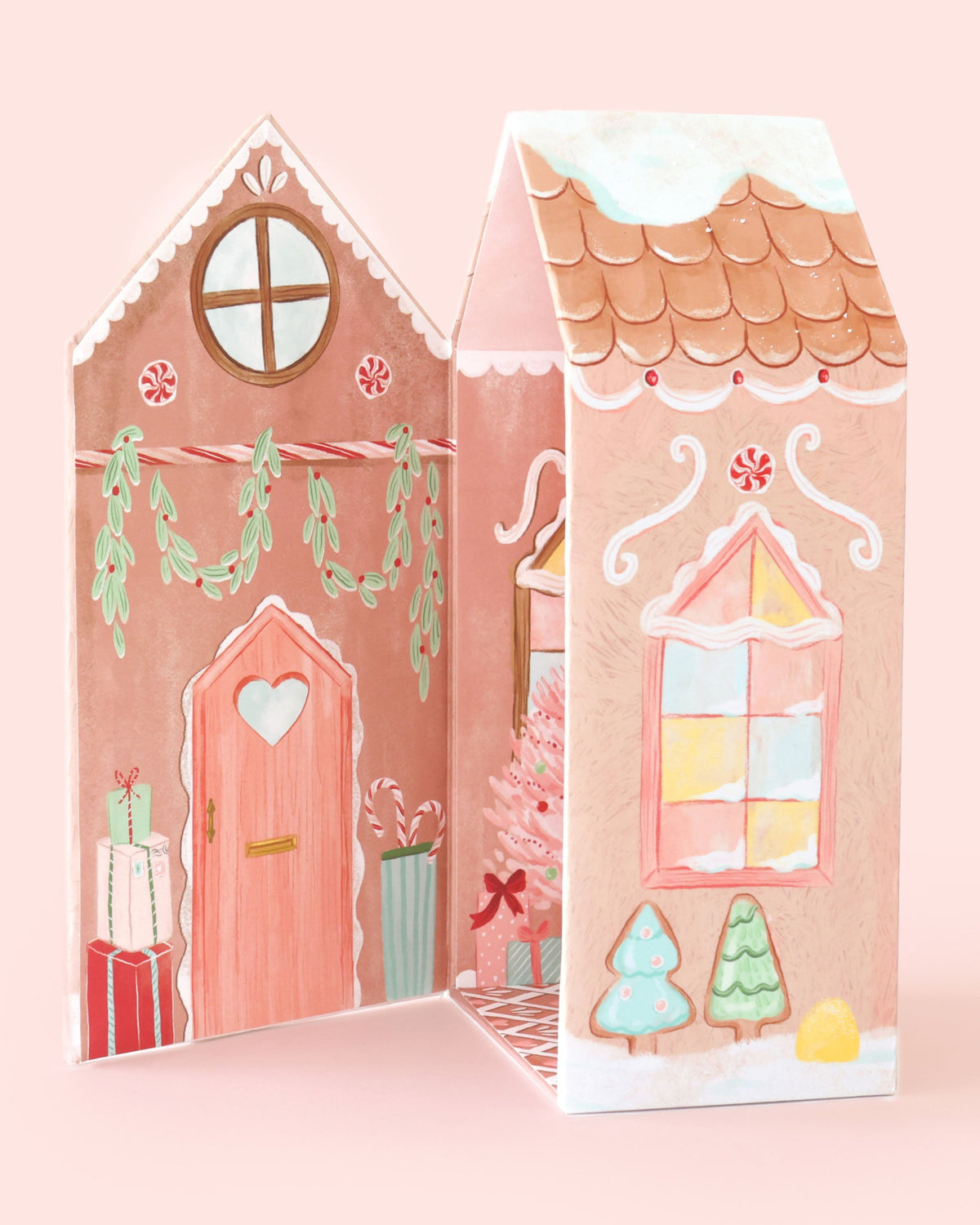 Small gingerbread doll from Cuddle + Kind featuring a swirl pattern, designed as a Sugarplum Girl plush toy.