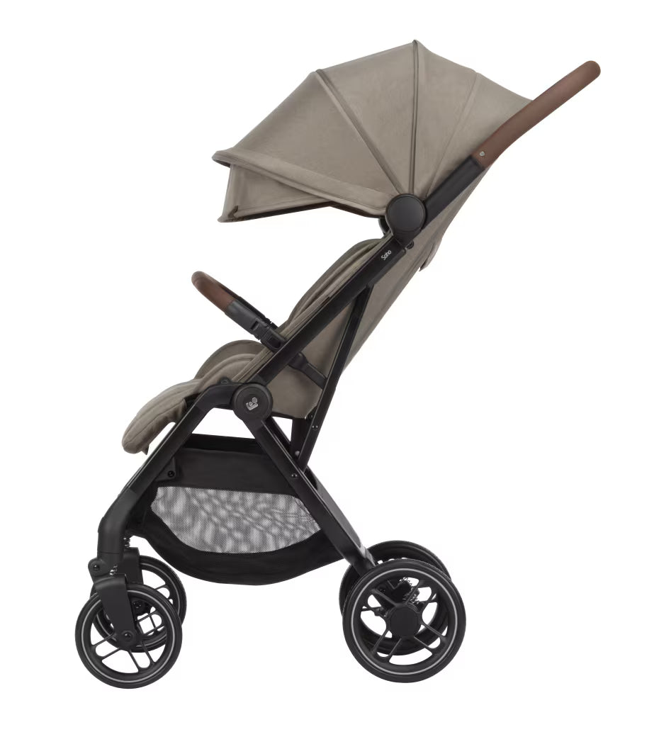 Maxi Cosi Soho Travel System with Truffle stroller, Pebble 360 Pro car seat, and FamilyFix 360 Pro Slide Base on a smooth surface.