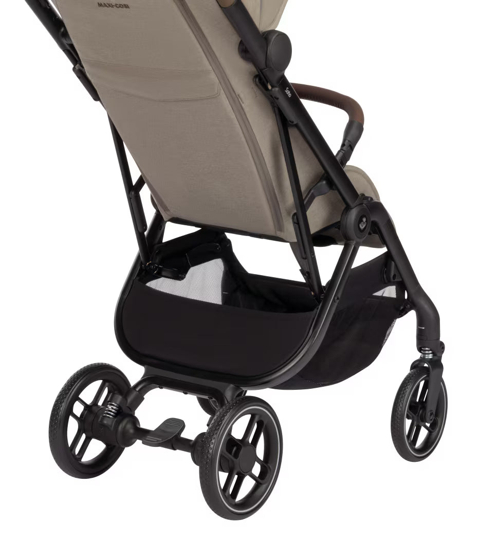 Maxi Cosi Soho Travel System with Truffle stroller, Pebble 360 Pro car seat, and FamilyFix 360 Pro Slide Base, showing the ultracompact design.