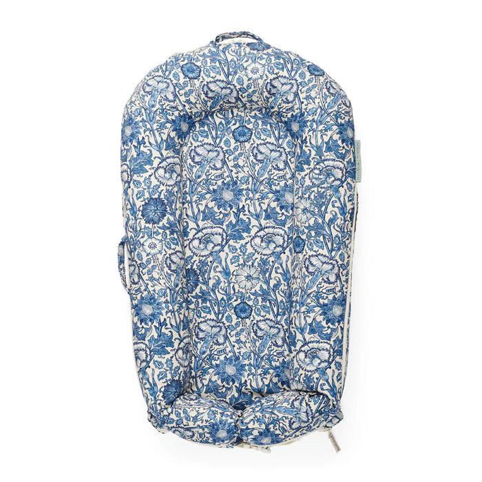 Pink Dock-A-Tot Deluxe+ Baby Dock for 0-8 months, featuring soft pink and rose design for infant comfort and safety.