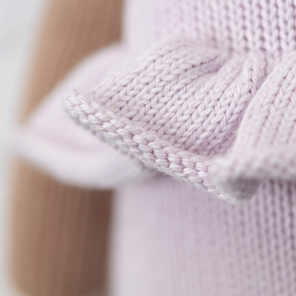 Close-up of the hand-knit ruffle detail on Violet the Fawn's romper - Cuddle + Kind