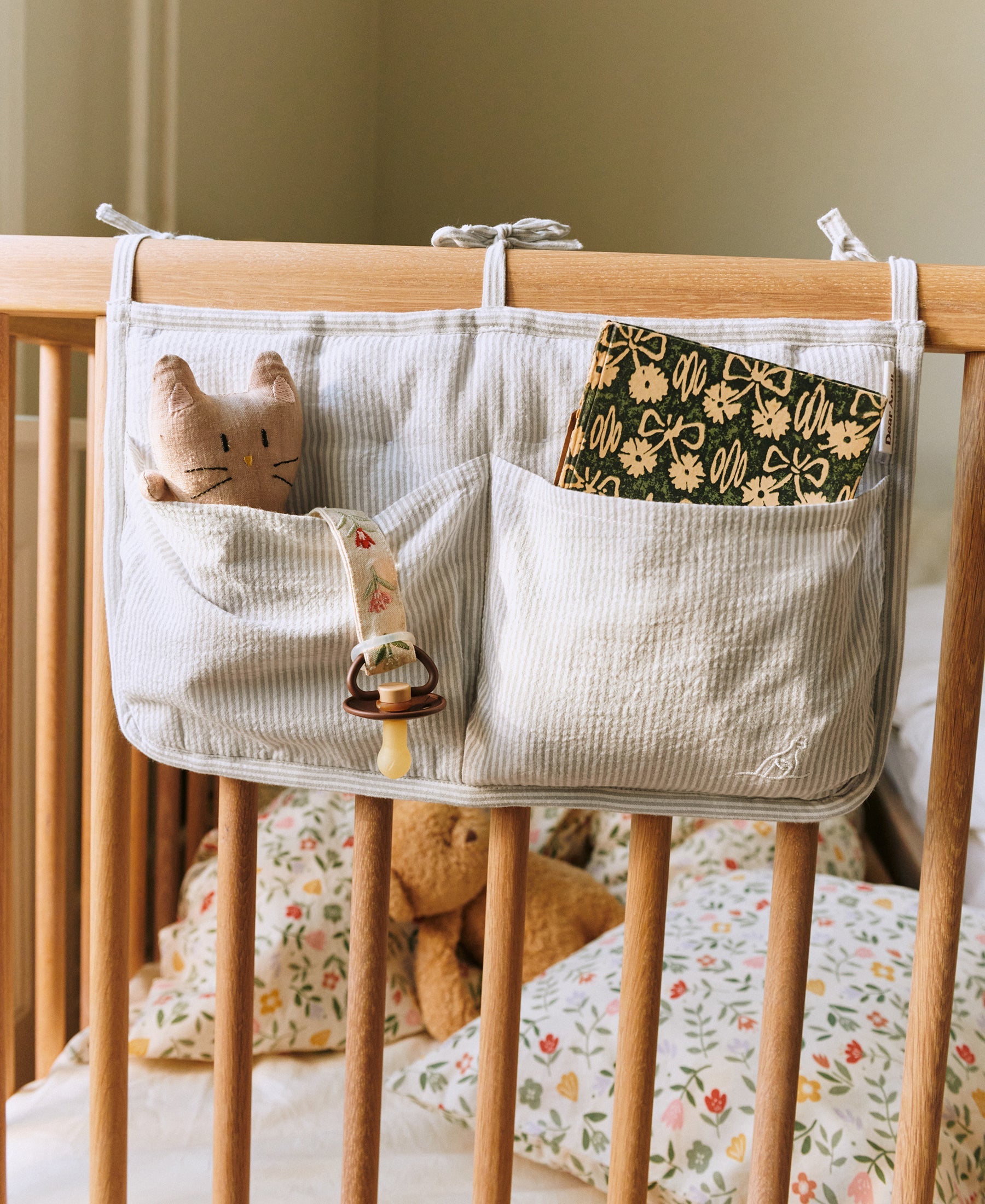Dear April Polly Bed Pocket in Dew Stripe, detail view.