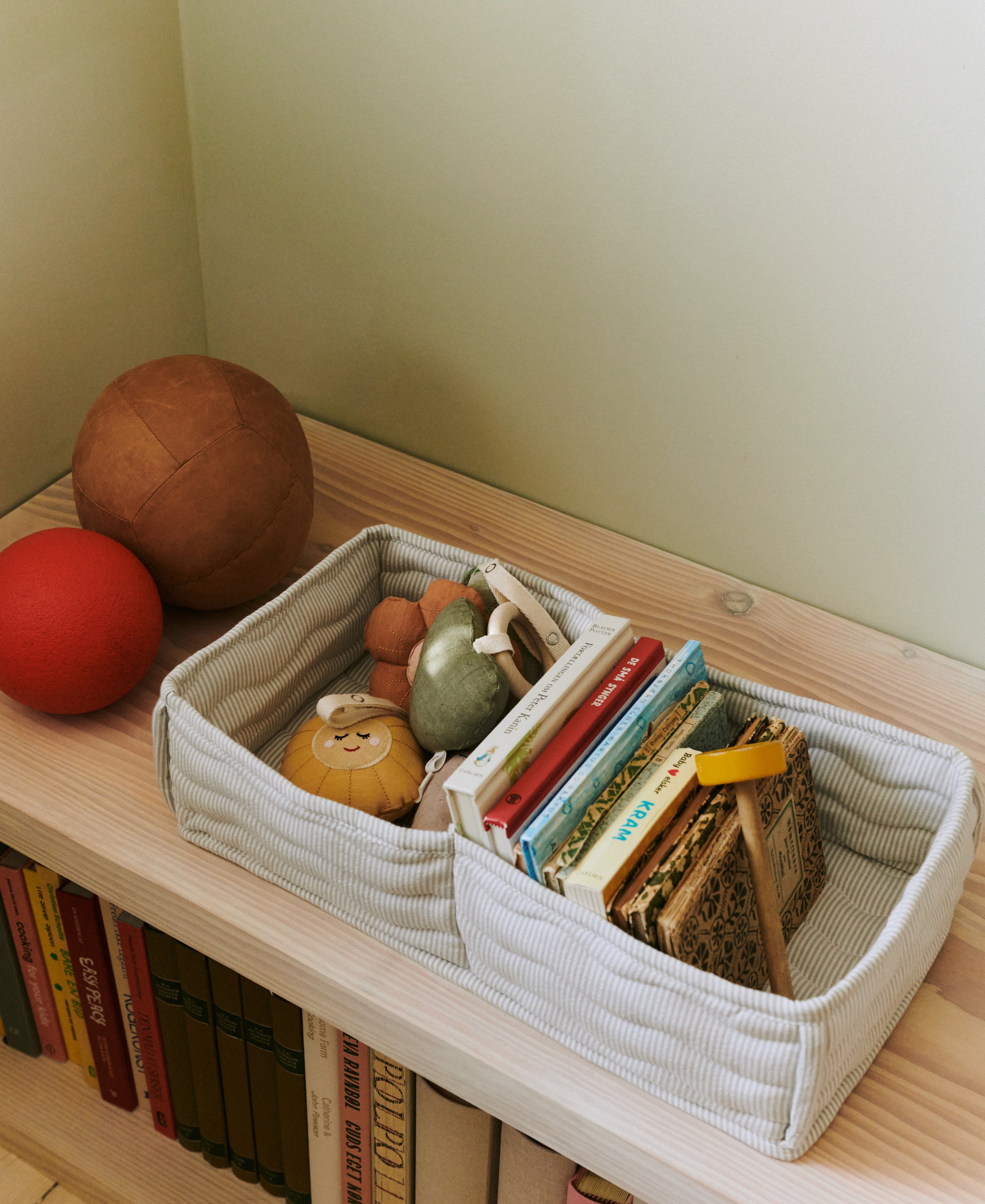 Dear April Otto Basket in Dew Stripe, compartment storage basket for the changing table.