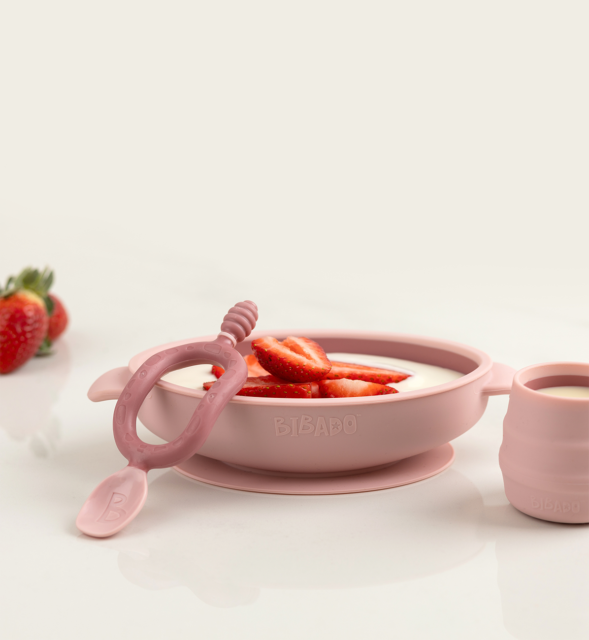 Bibado silicone suction bowl in blush color, designed for toddlers, with a secure suction base and smooth silicone surface.