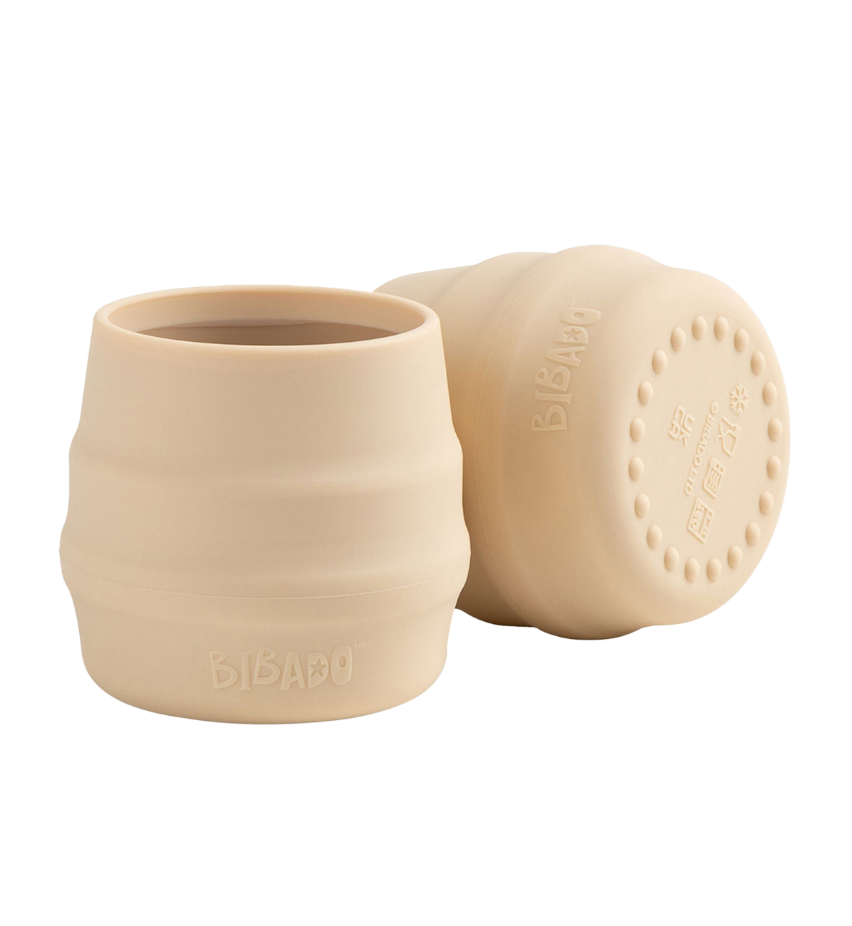 Two Bibado Sippit Cups in fawn color, durable toddler feeding cups with spill-proof design for young children.