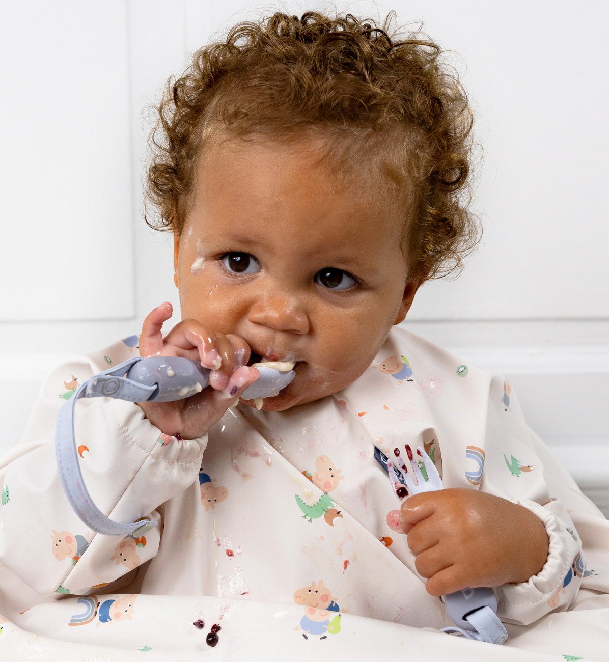 Bibado Handi Cutlery Mist set with colorful, ergonomically designed utensils for easy gripping and eating assistance.