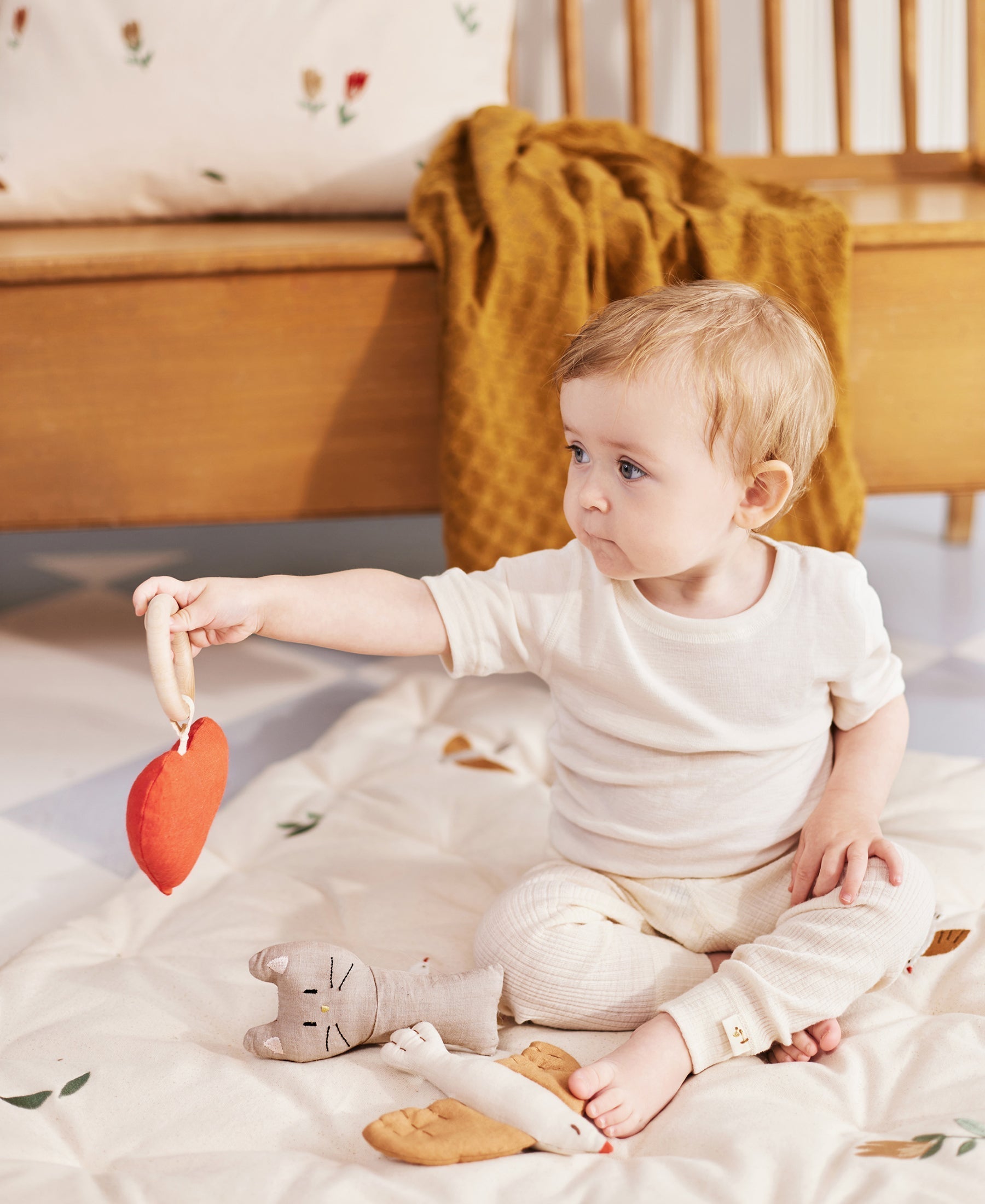 Dear April Meri Play Mattress Songbirds with colorful fabric and soft padding, designed for young children’s play and rest.