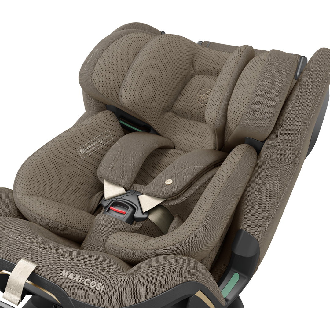 Maxi Cosi Emerald 360 Pro travel system with Twillic Truffle stroller and car seat, showing the stylish design and features.