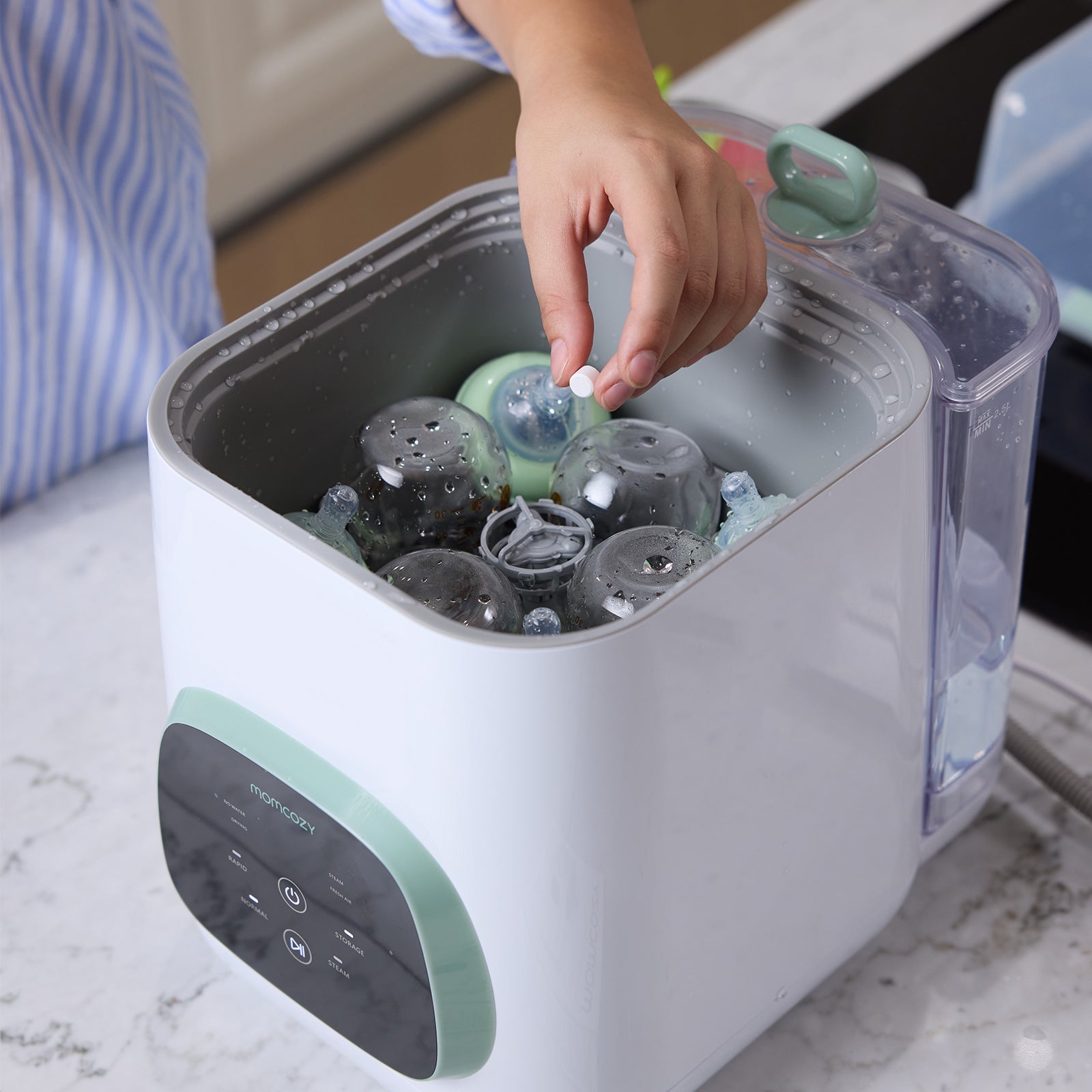 Momcozy Detergent Tablets in tray