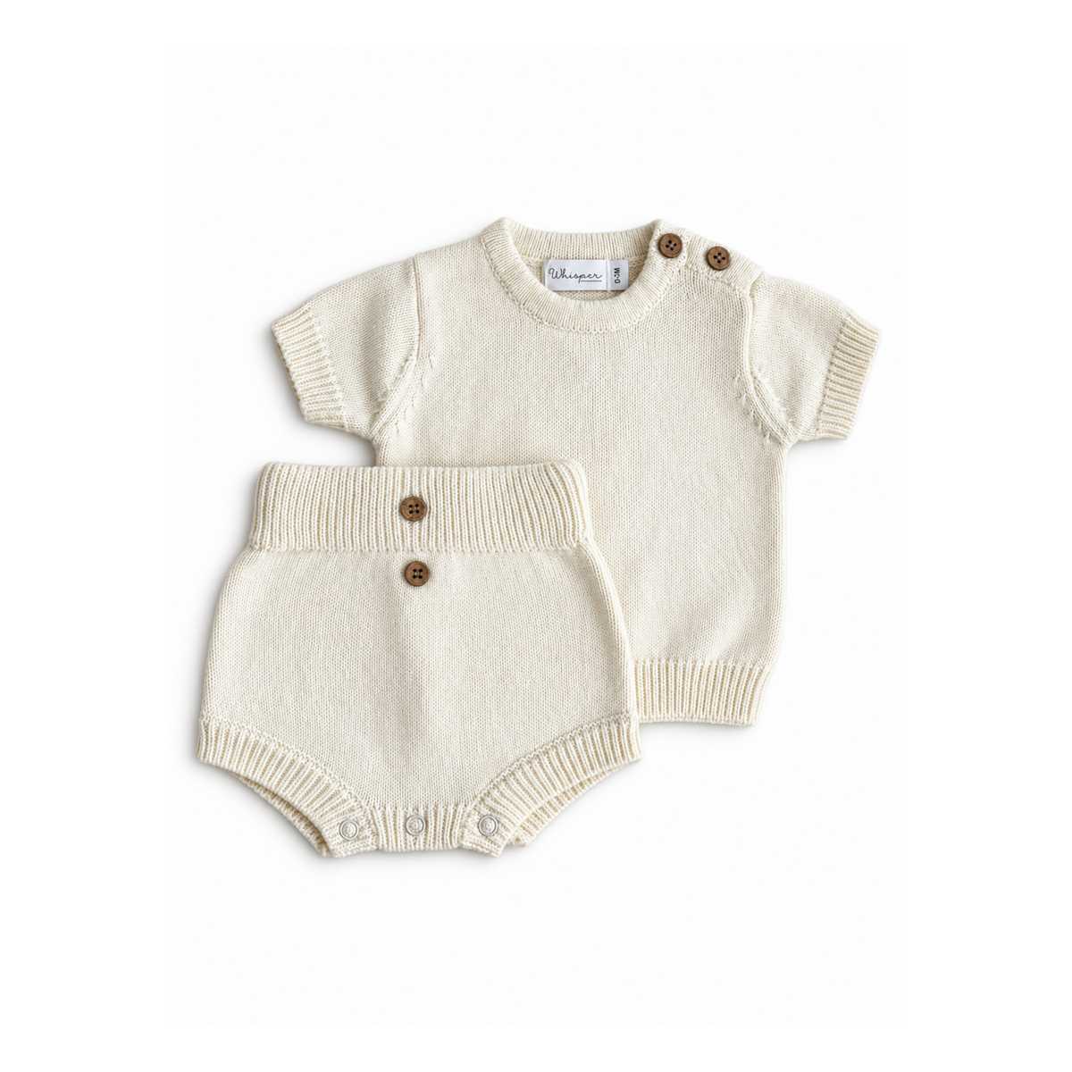 Cream knitted top and bloomer set for baby and toddler by Bubbadue, featuring soft, cozy knit fabric and adorable design.